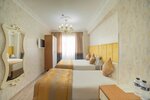 Улучшенный трехместный номер (Family) в Miran Hotel