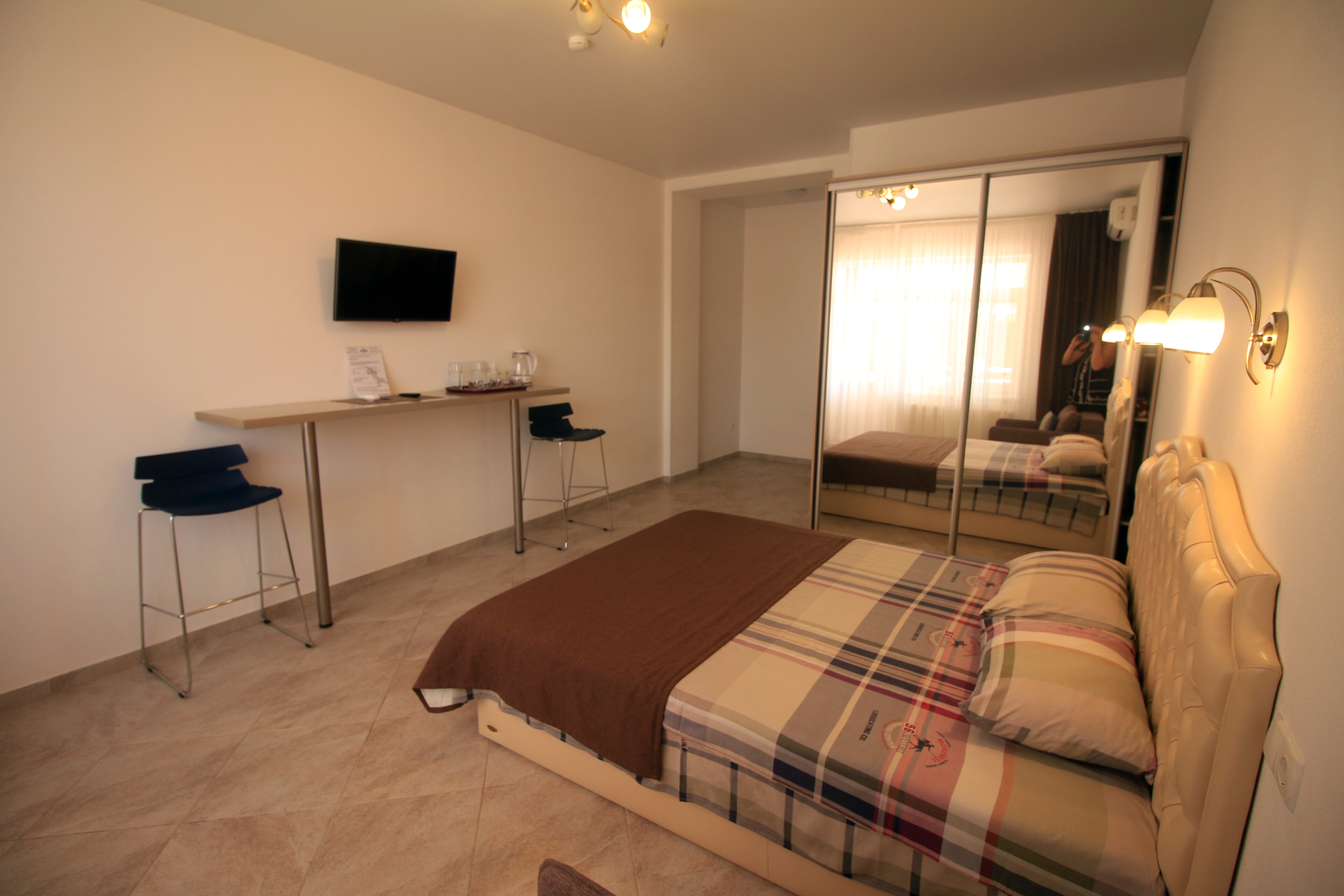 Трехместный номер с балконом