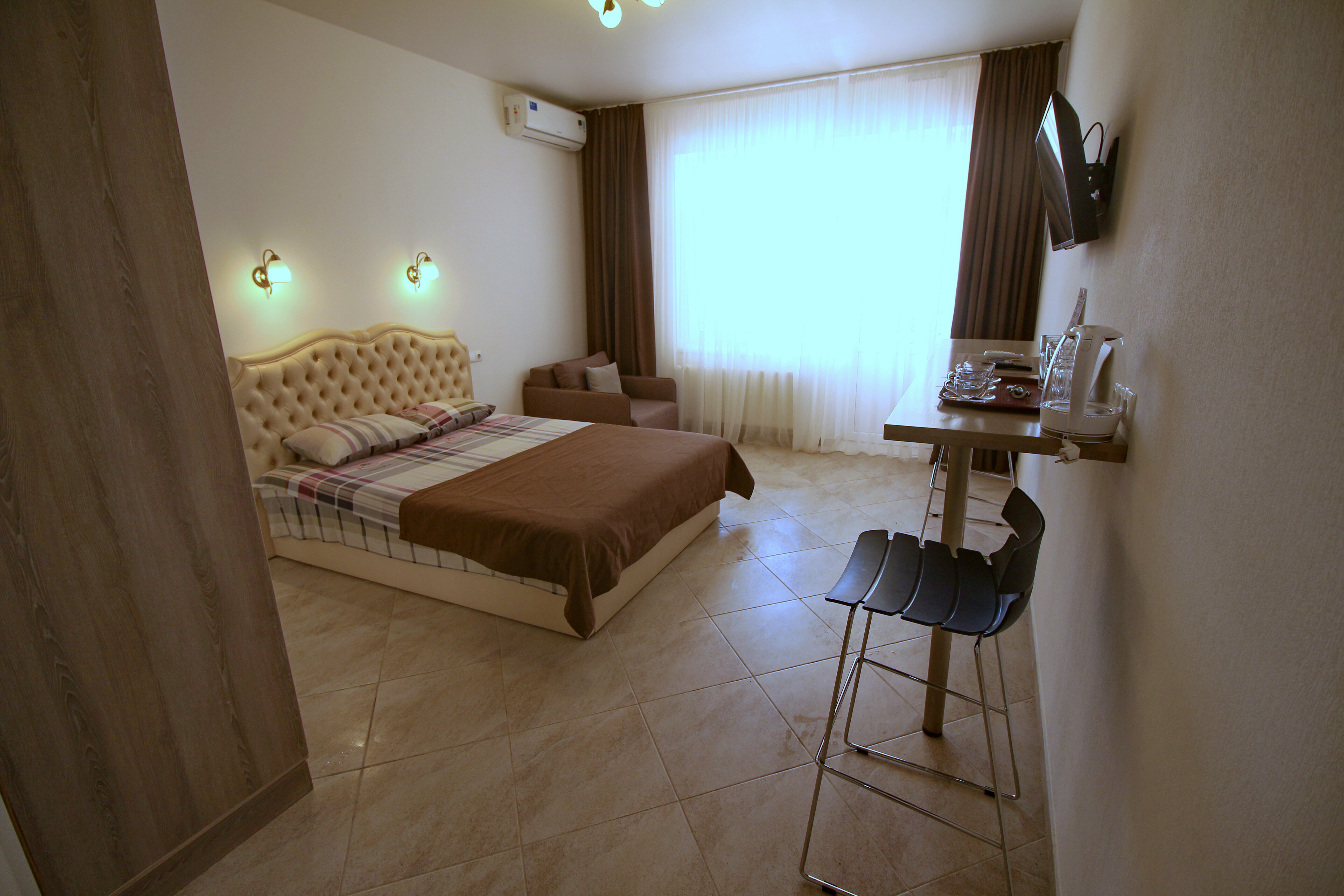 Трехместный номер с балконом