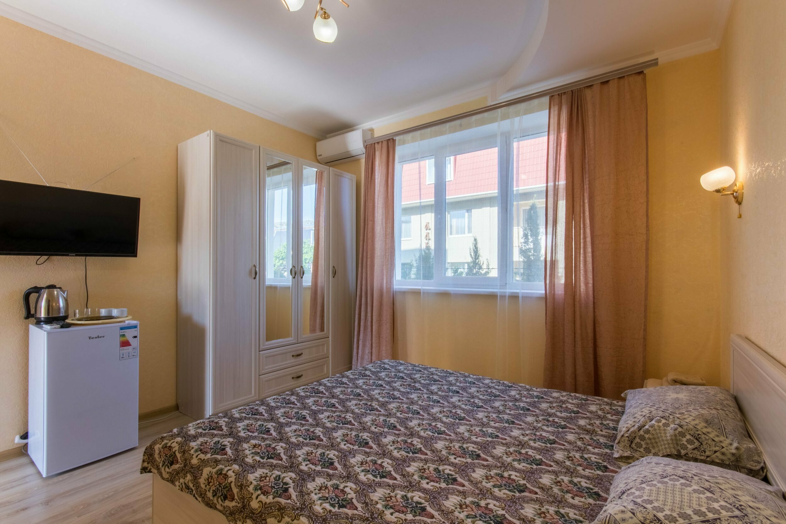 Трехместный номер с балконом