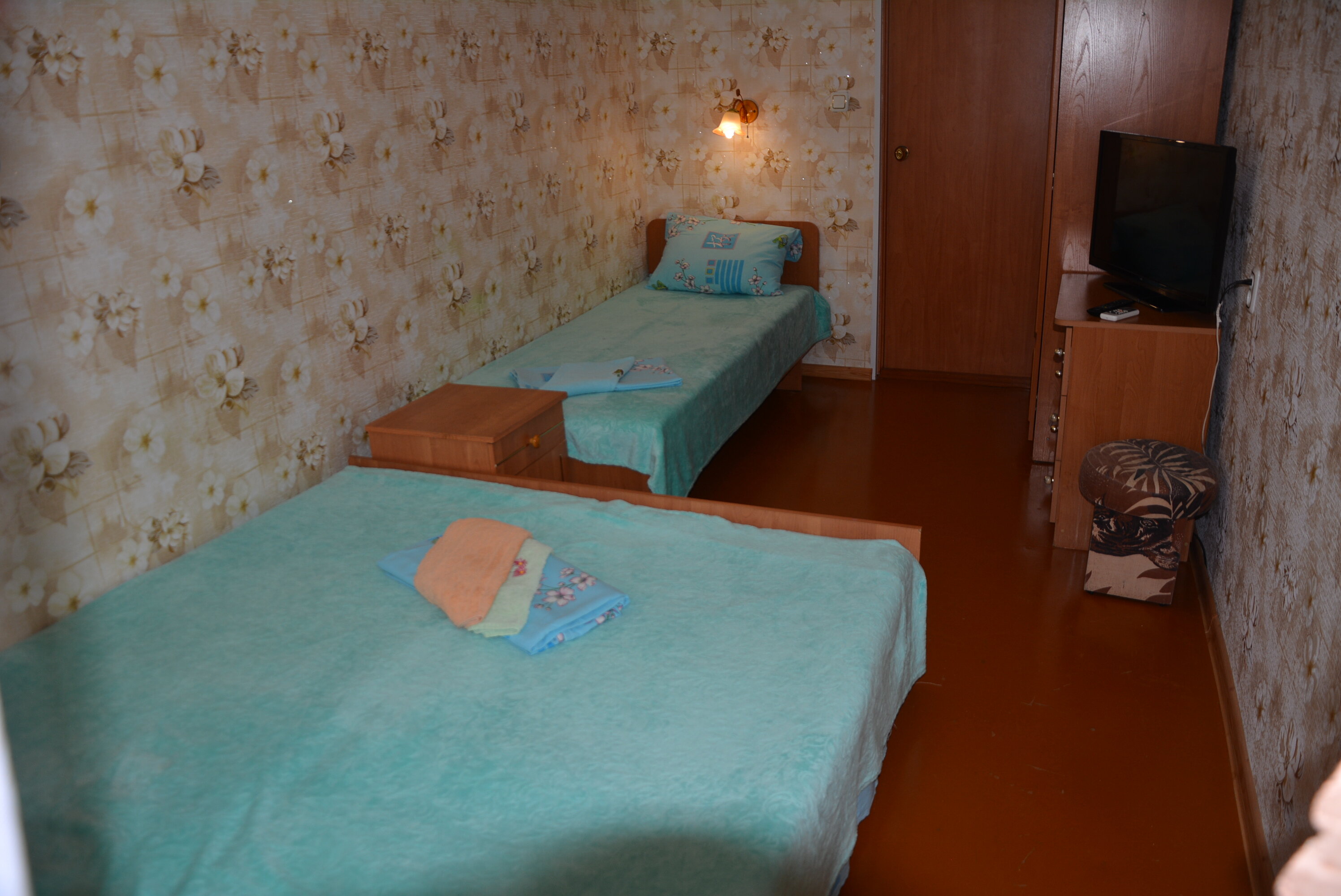 Трехместный номер с балконом