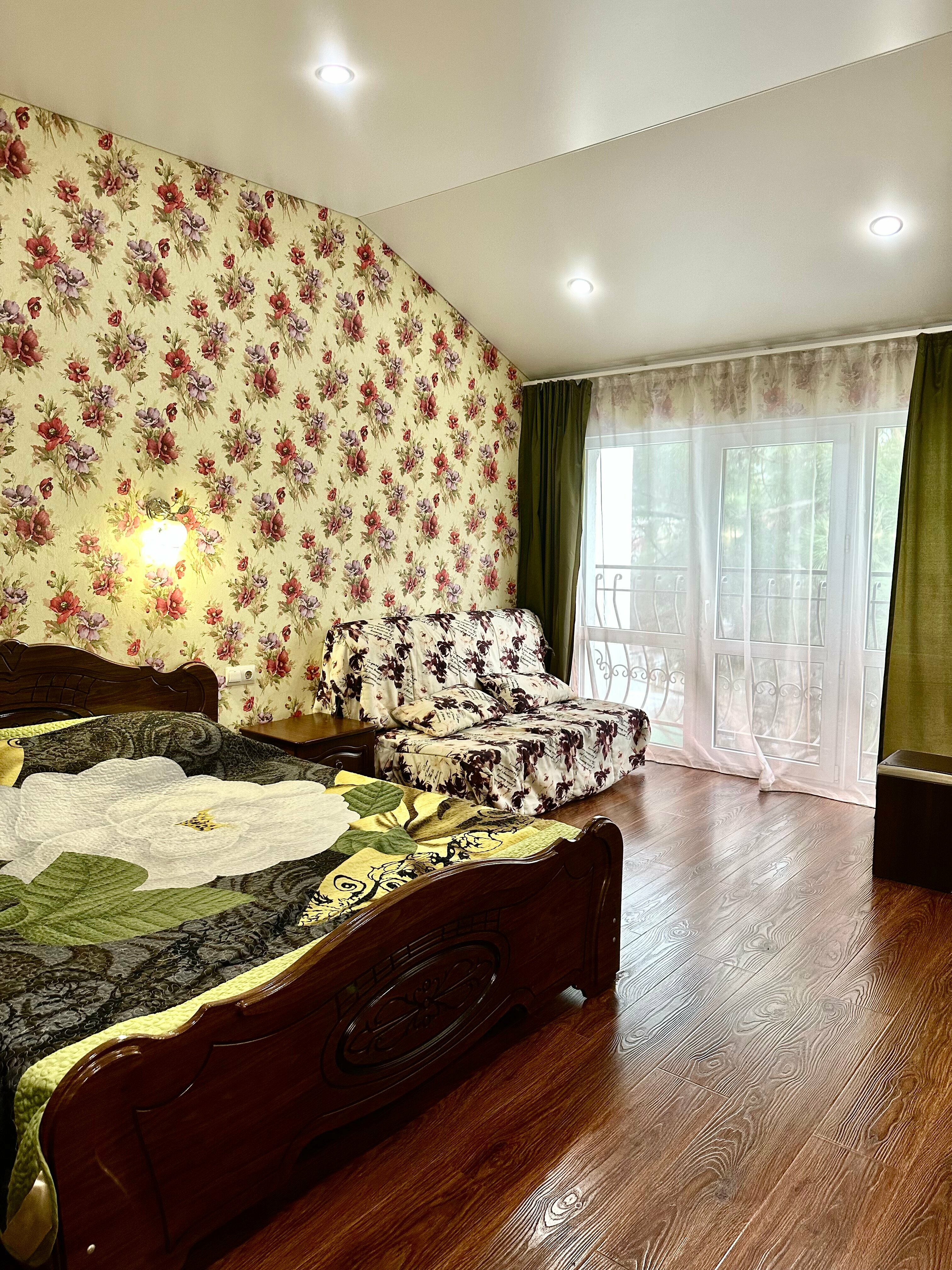 Улучшенный четырехместный номер