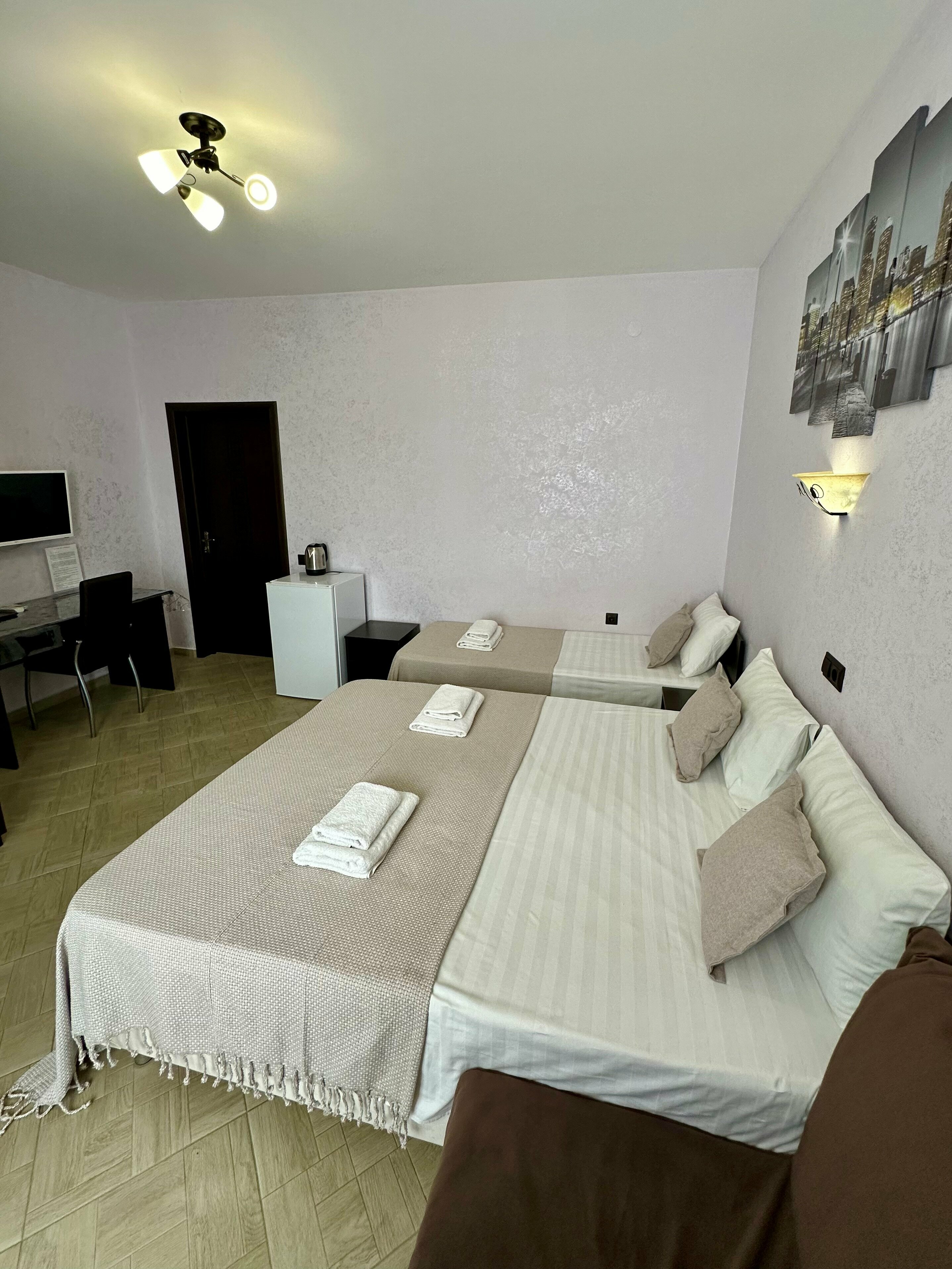 Улучшенный трехместный номер