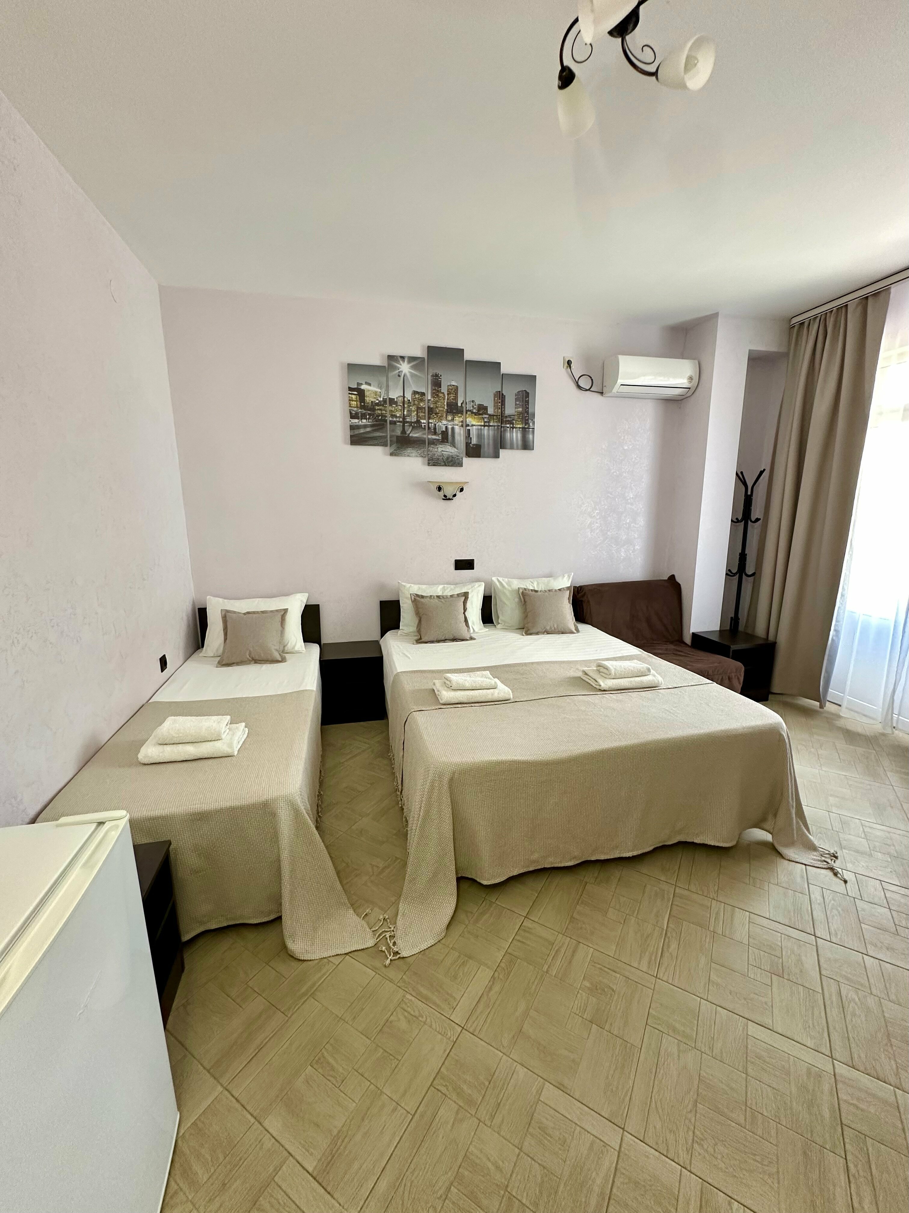 Улучшенный трехместный номер