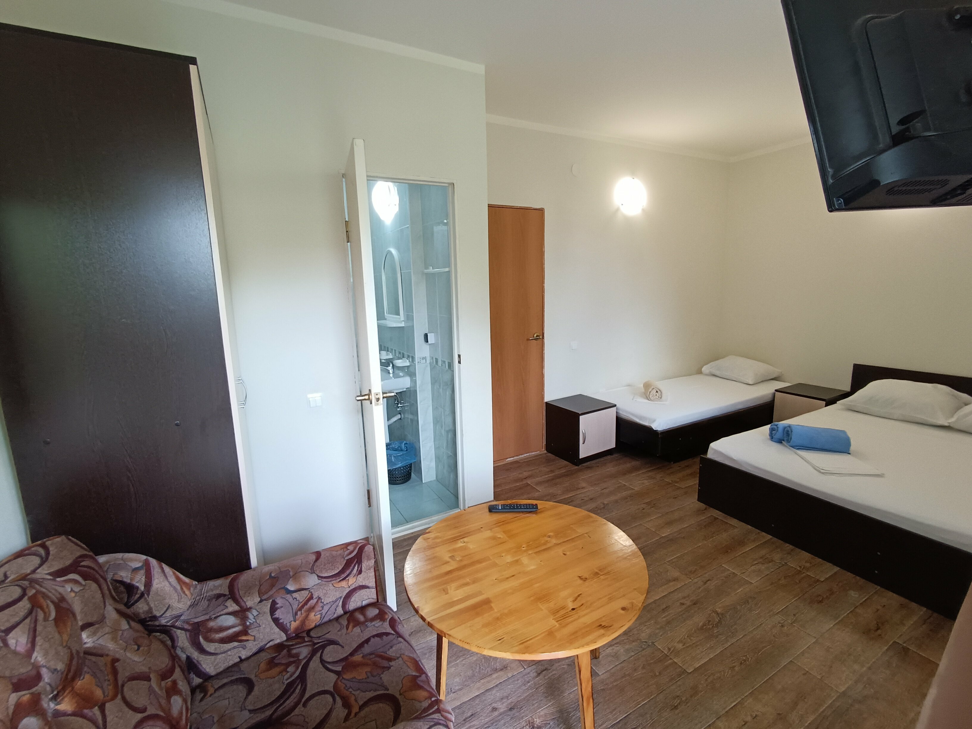 Трехместный номер с видом на сад