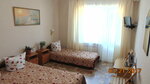 Трехместный номер с балконом в Коттедж Одиссей