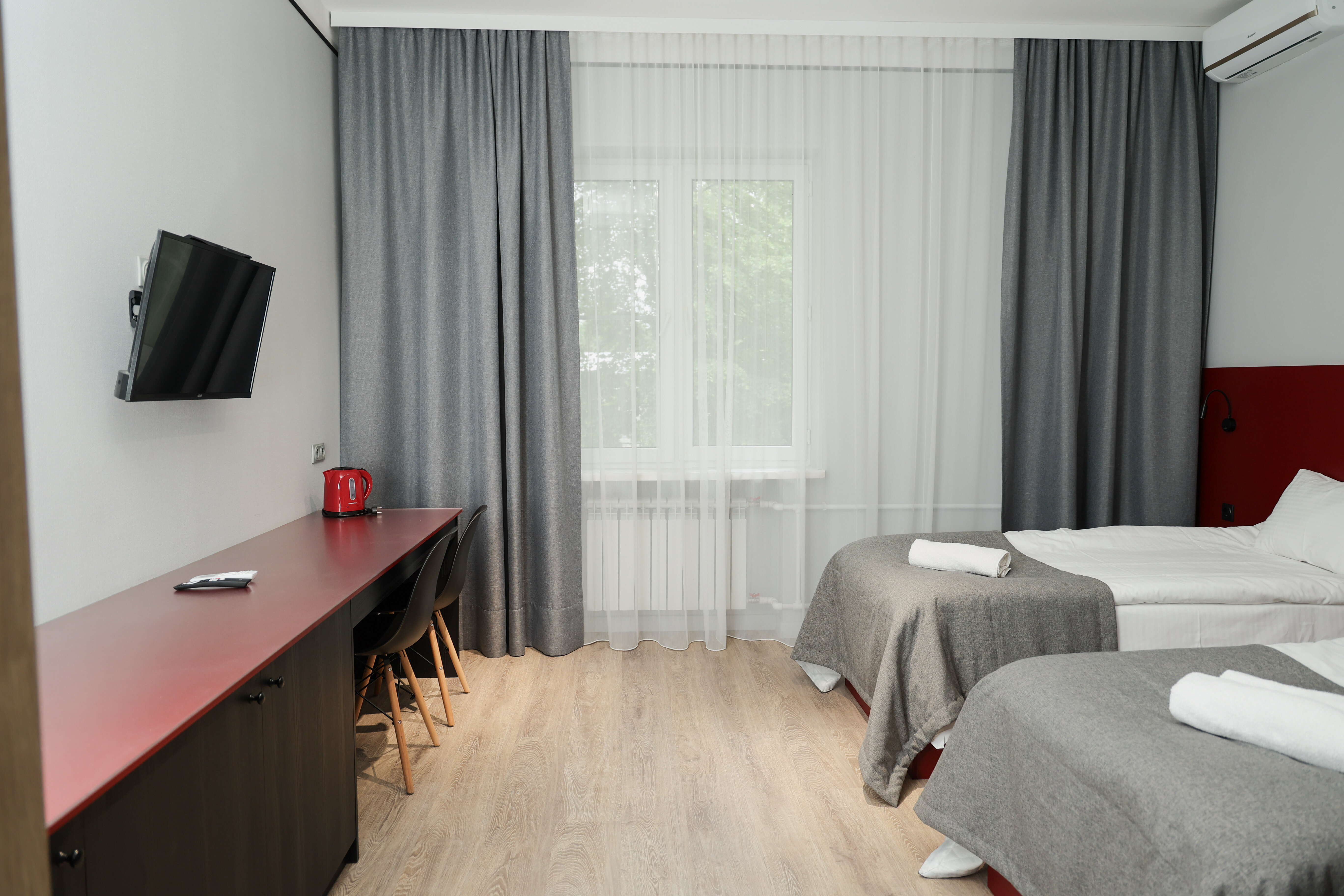 Улучшенный двухместный номер с 2 отдельными кроватями