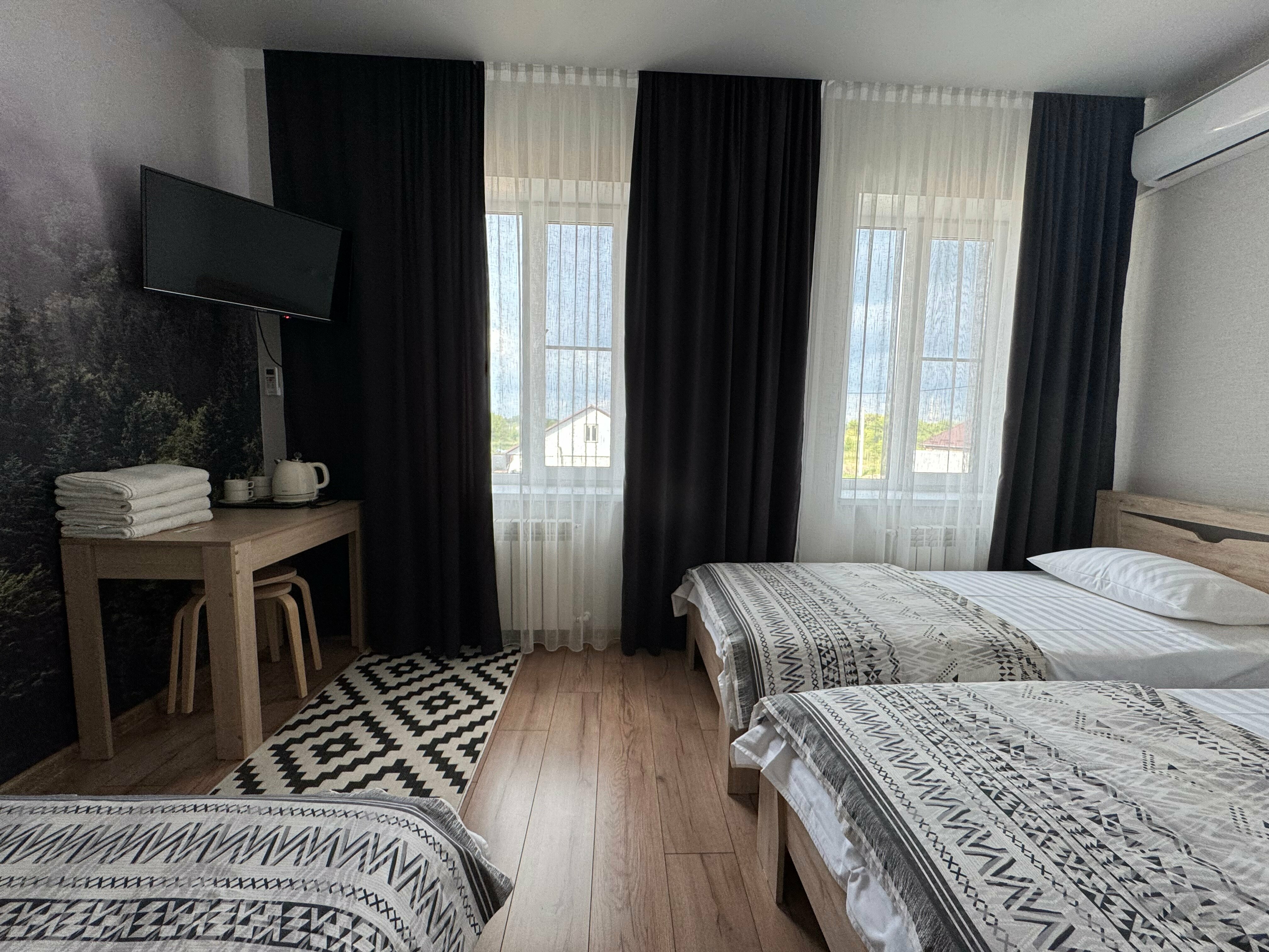 Четырехместный номер с ванной