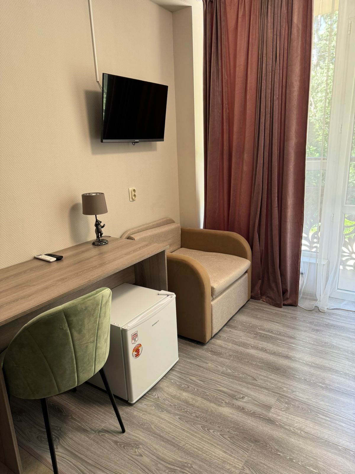 Трехместный номер с балконом