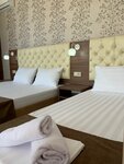 Трехместный номер Делюкс в Golden Plaza