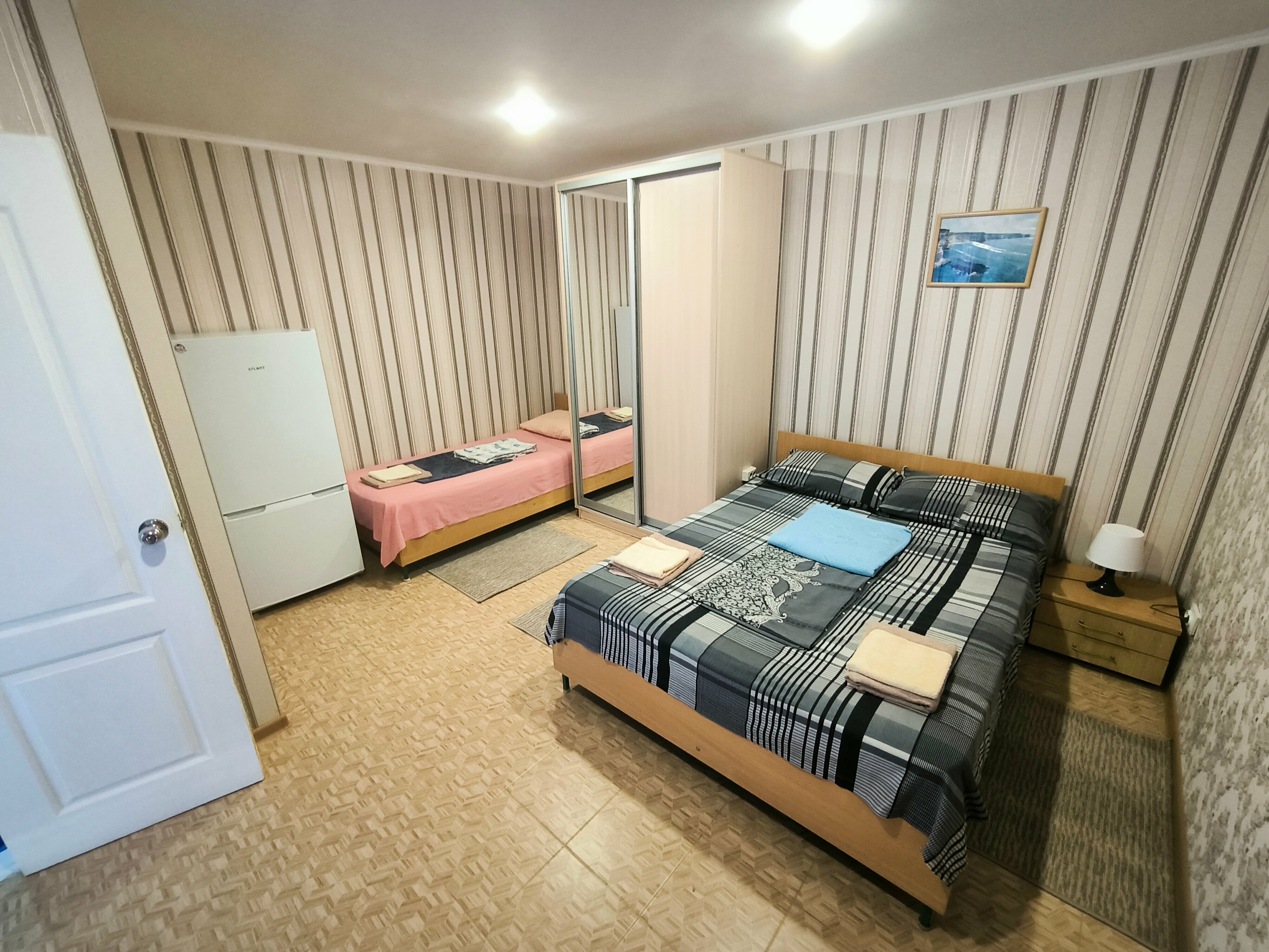 Трехместный номер с балконом