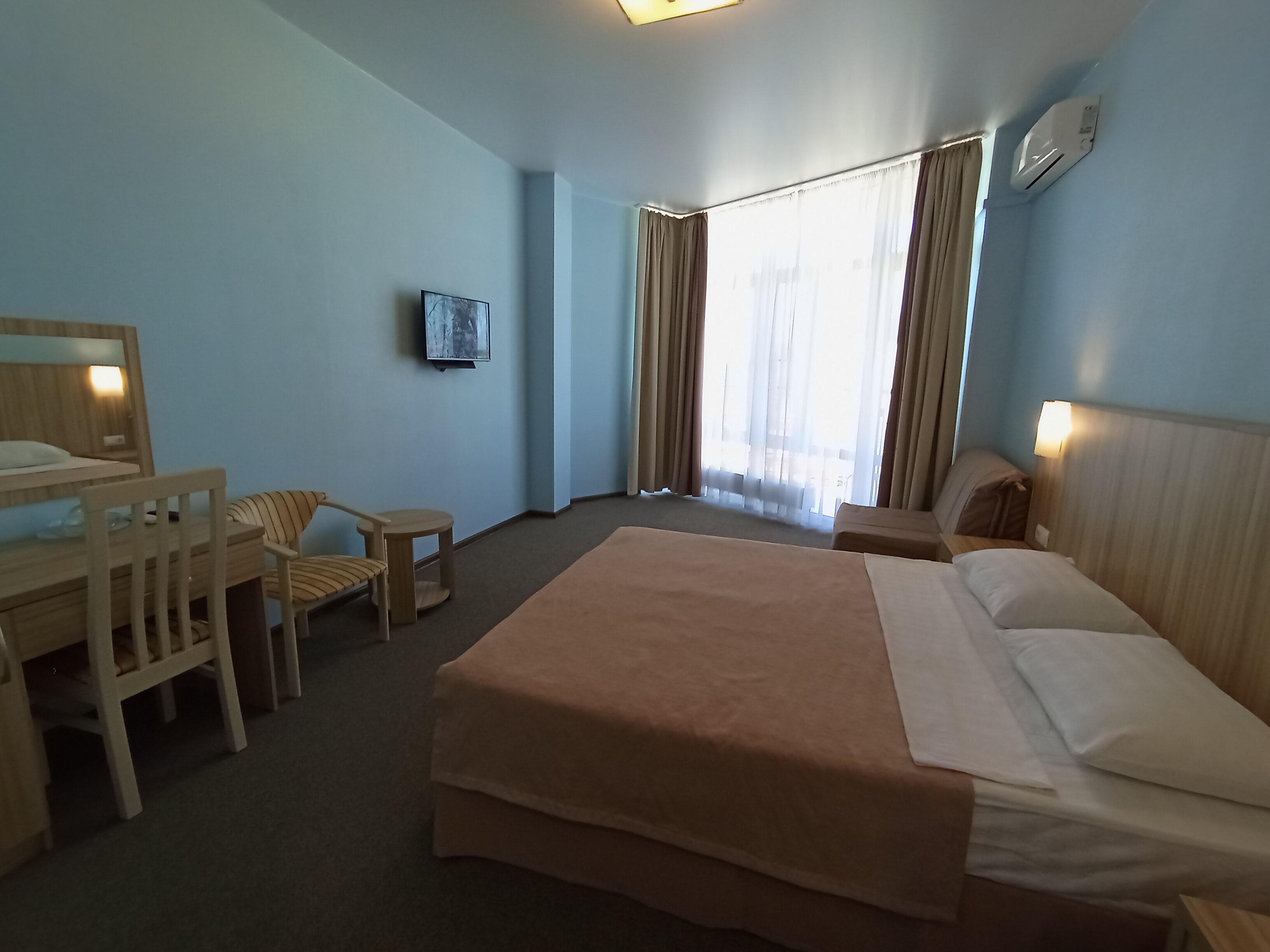 Трехместный номер Делюкс