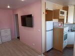 Семейный номер с балконом в Апартаменты Уютный Дом