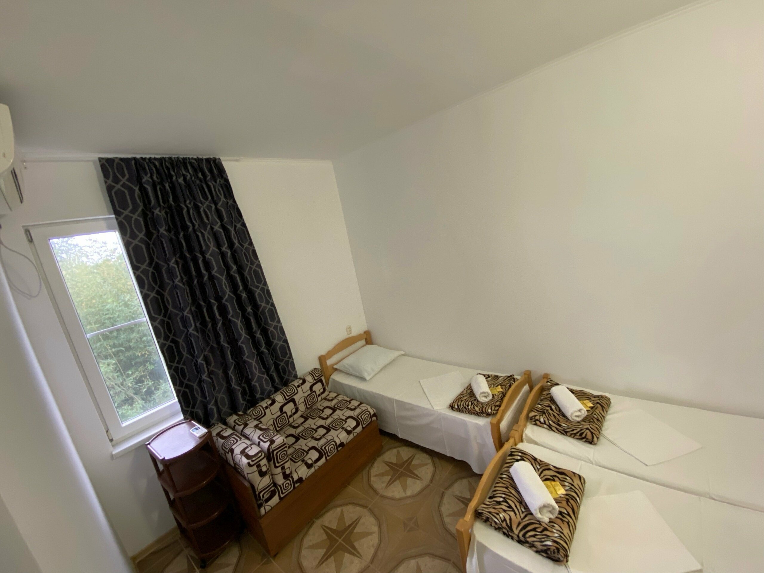 Двухместный номер с 2 отдельными кроватями и душем