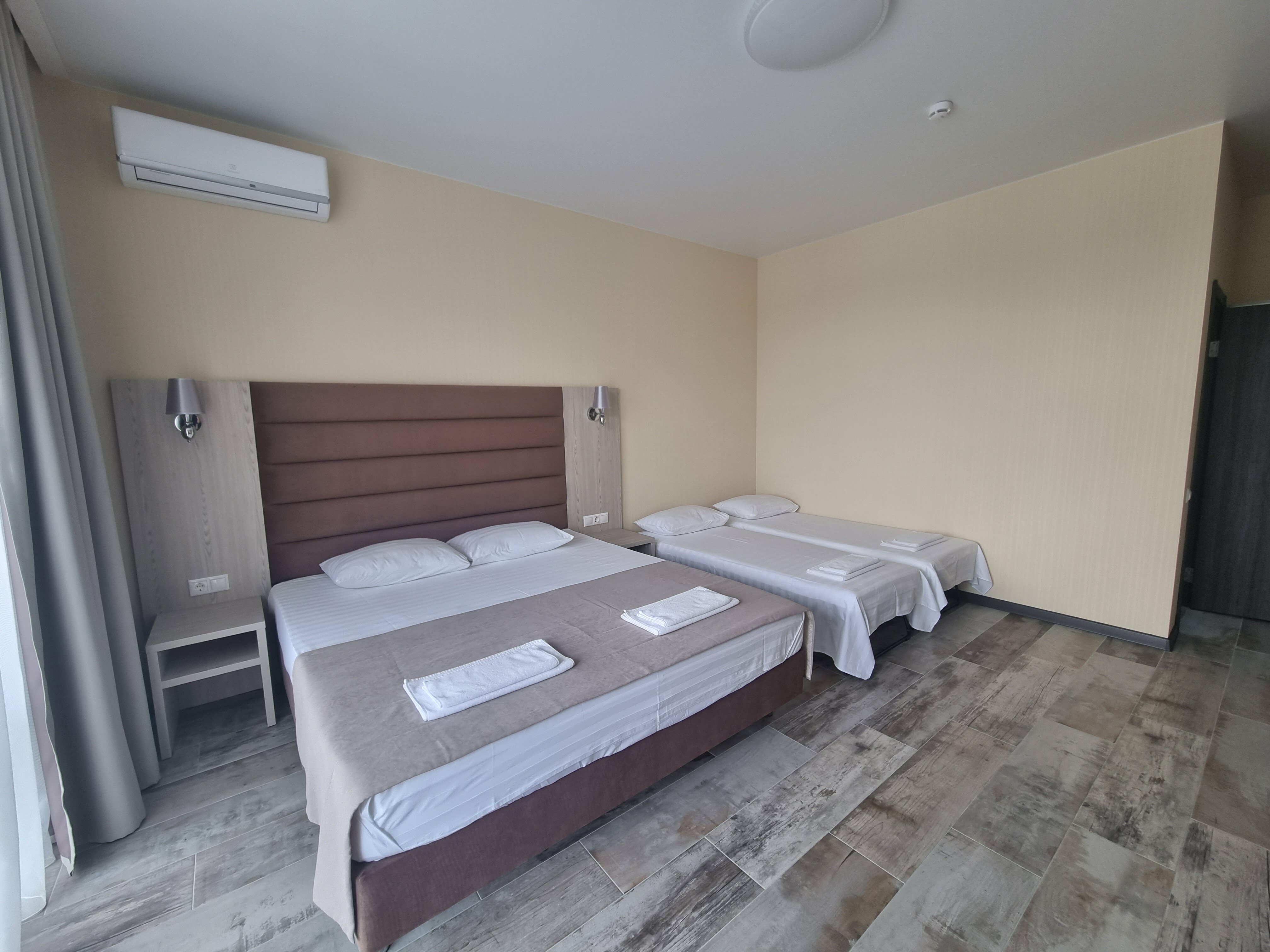 Улучшенный четырехместный номер