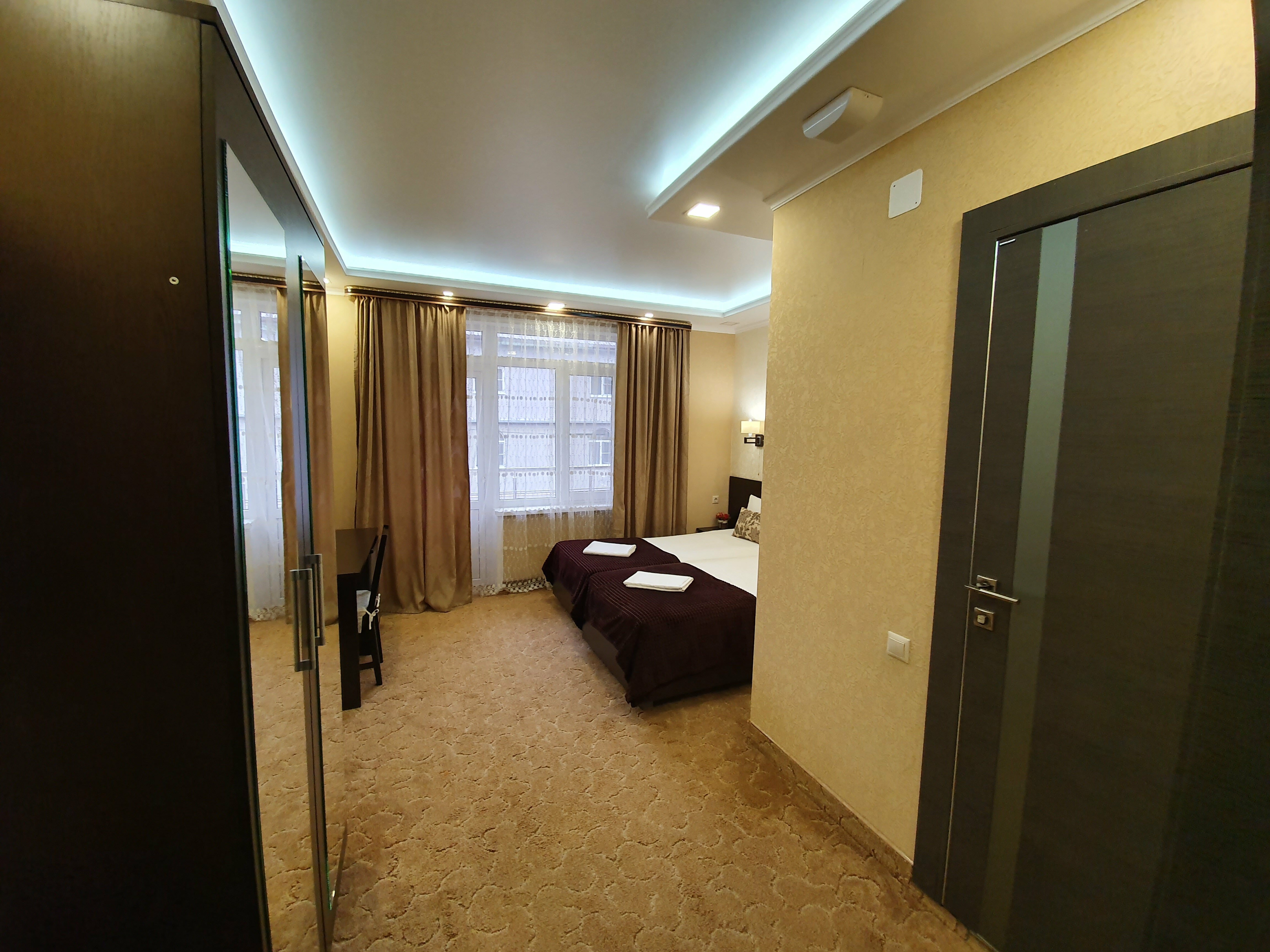 Двухместный номер с 2 отдельными кроватями и балконом