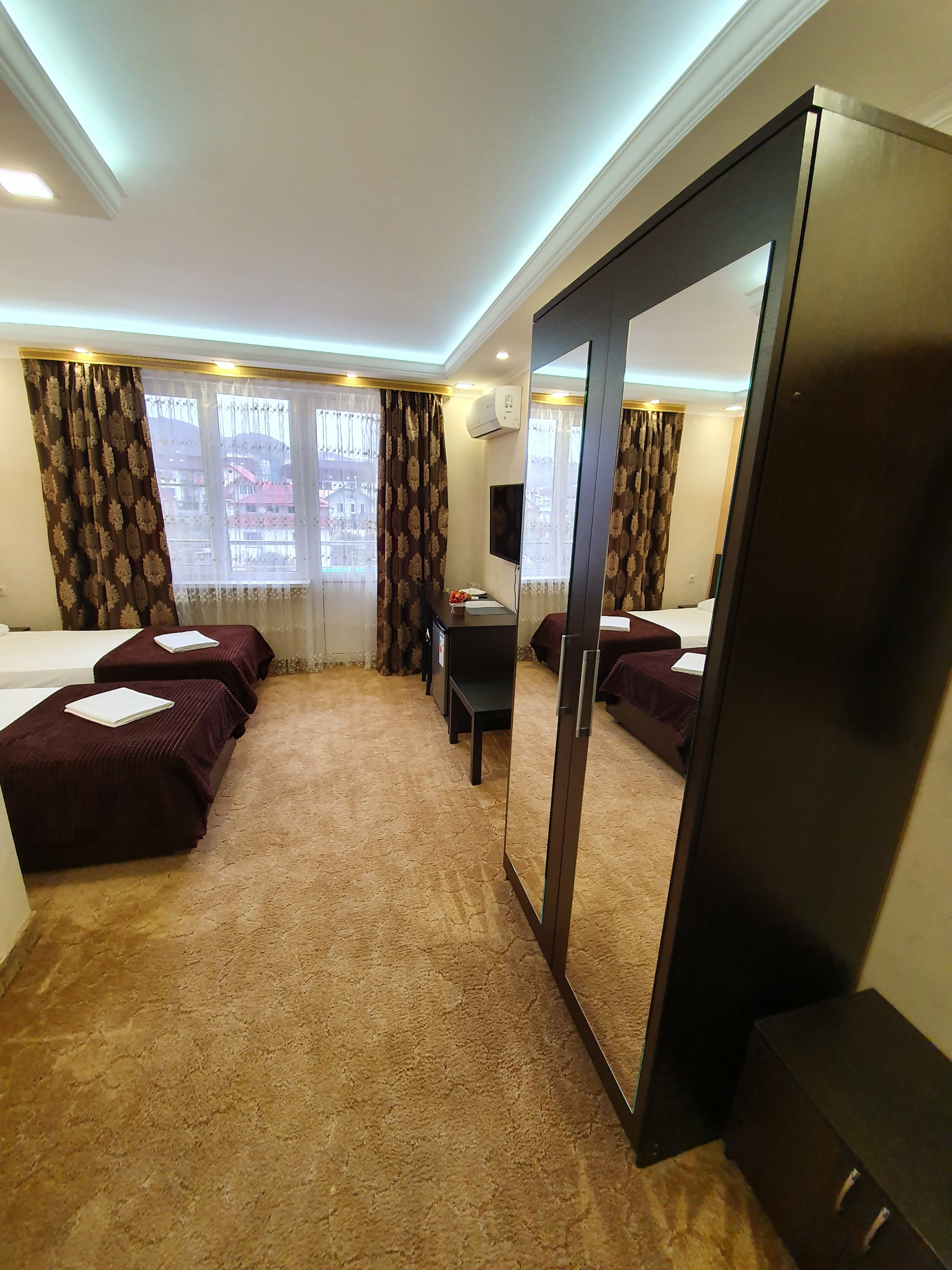 Двухместный номер с 2 отдельными кроватями и балконом