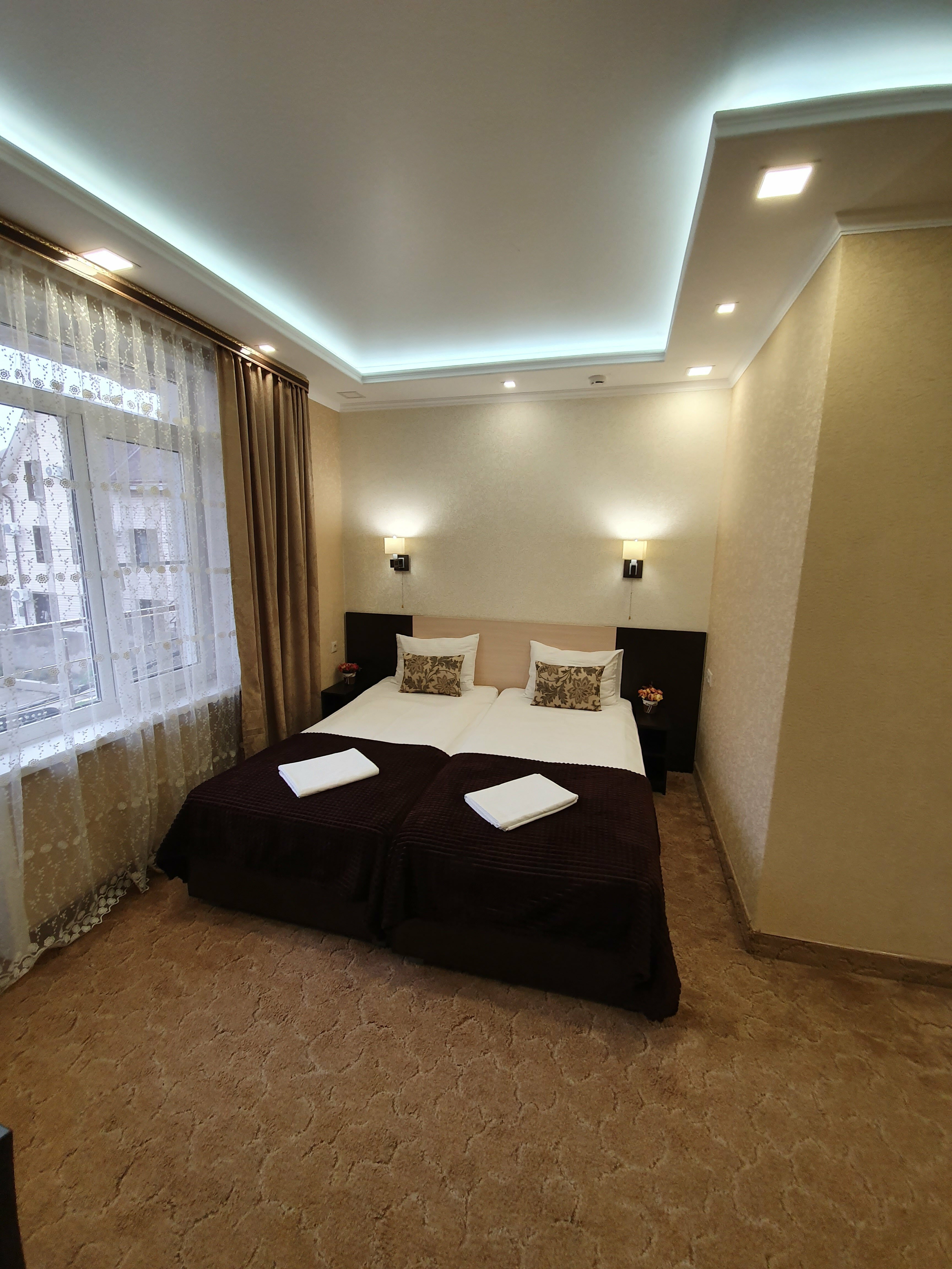 Двухместный номер с 2 отдельными кроватями и балконом