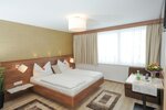 Одноместный бизнес-номер, вид на сад в Hotel Restaurant Wallner