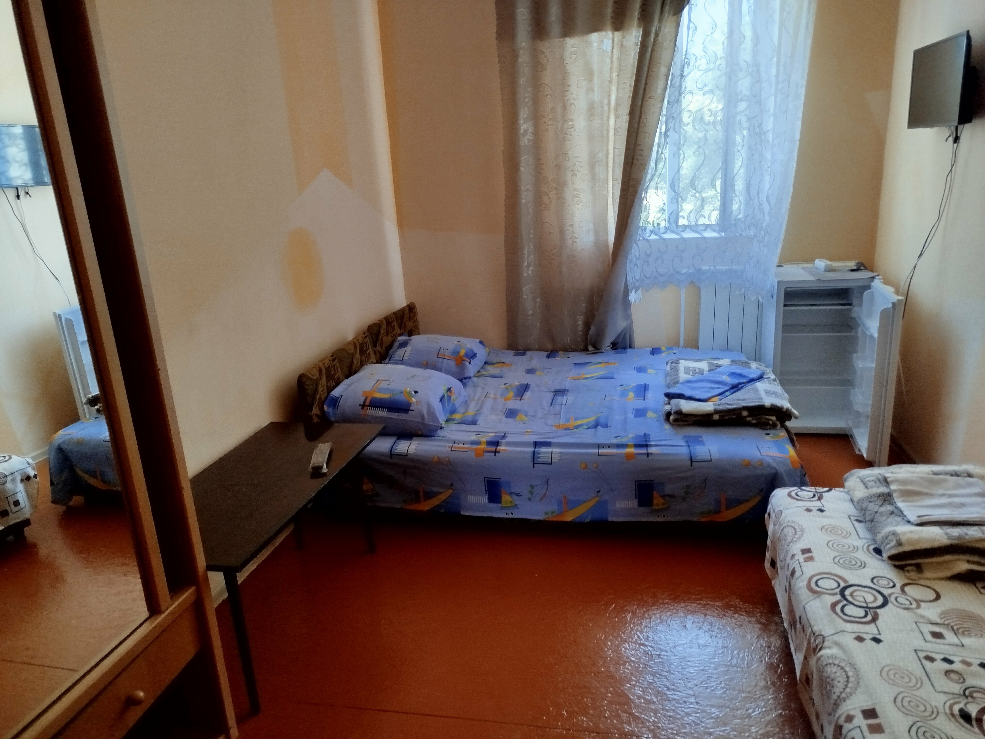 Трехместный номер с видом на сад