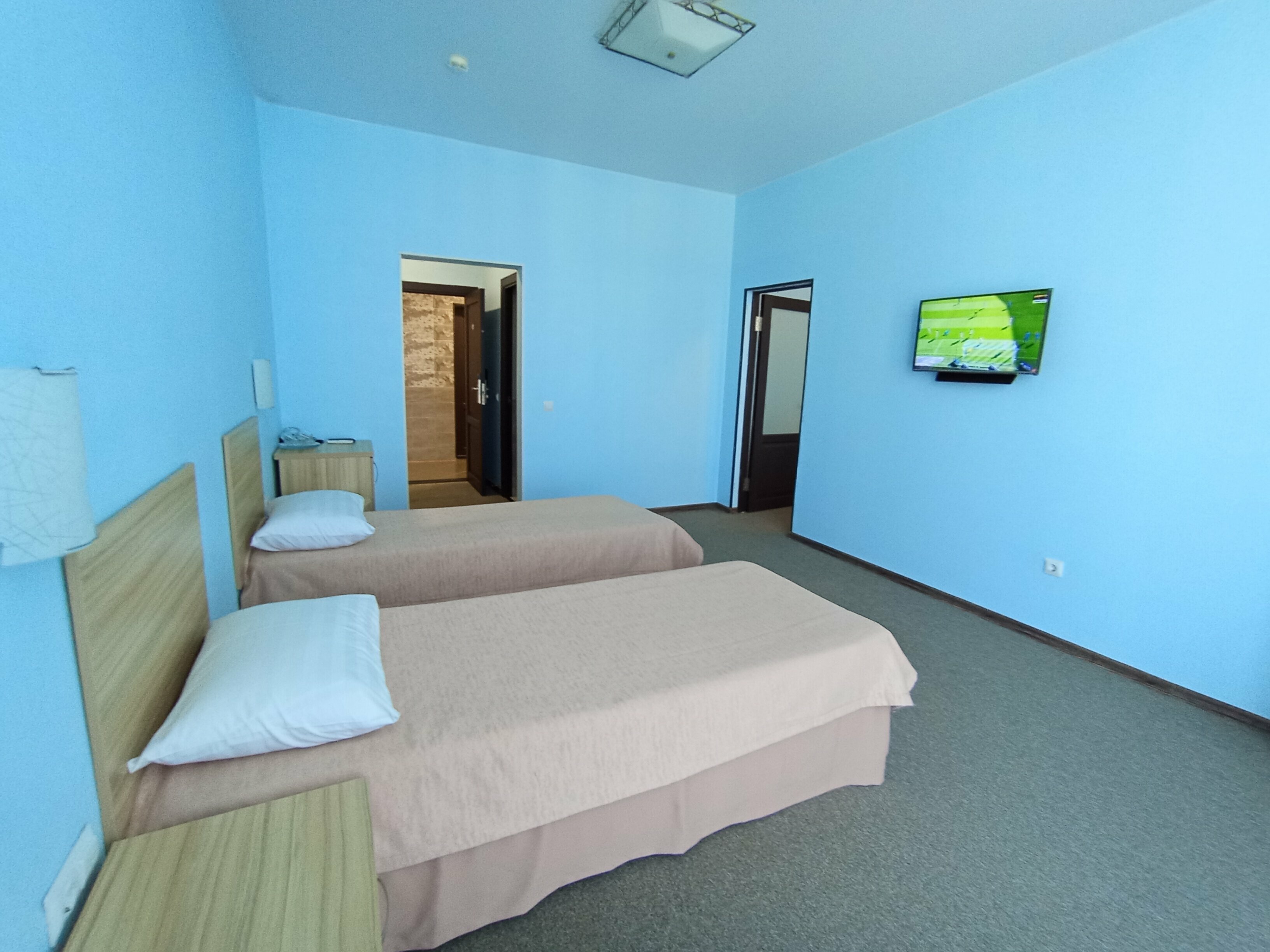 Четырехместный номер Делюкс