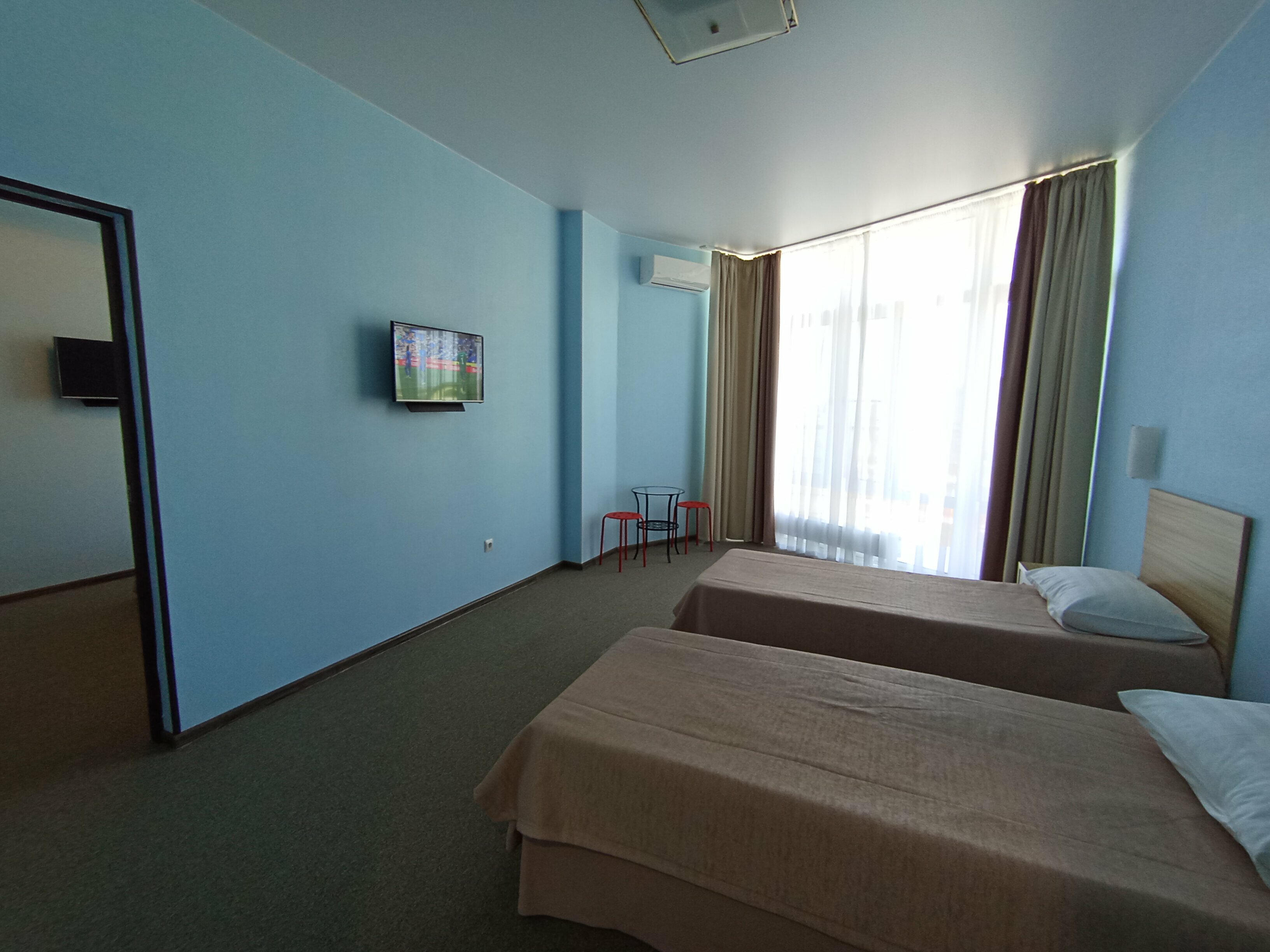 Четырехместный номер Делюкс