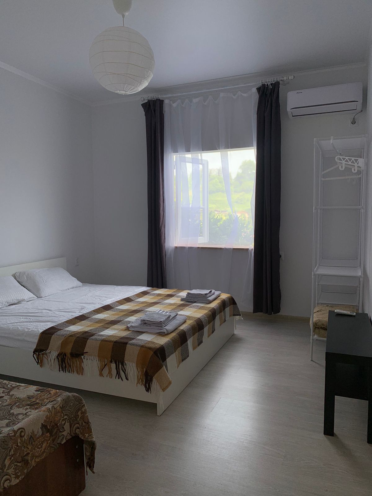 Трехместный номер с видом на сад