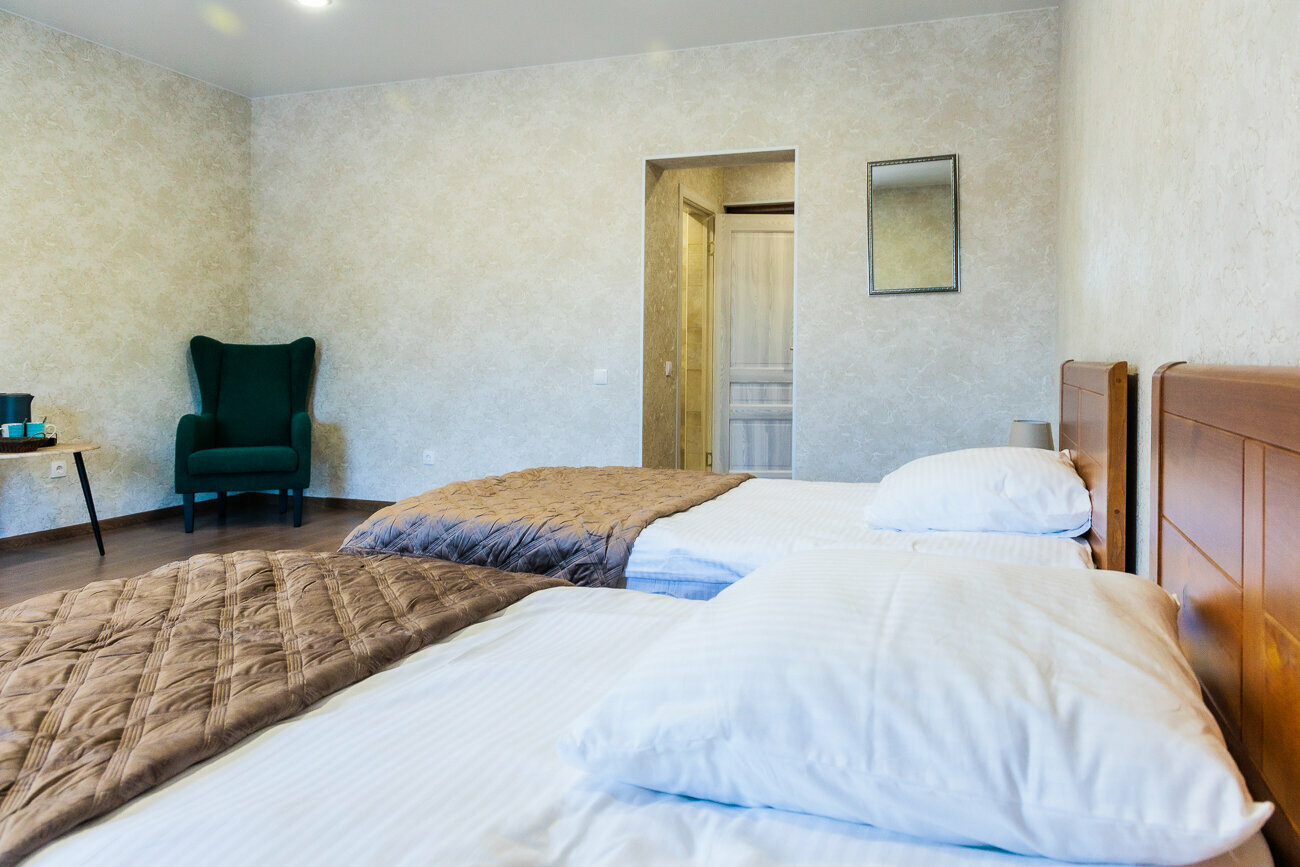 Двухместный номер с 2 отдельными кроватями и душем