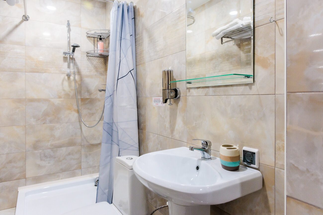 Двухместный номер с 2 отдельными кроватями и душем