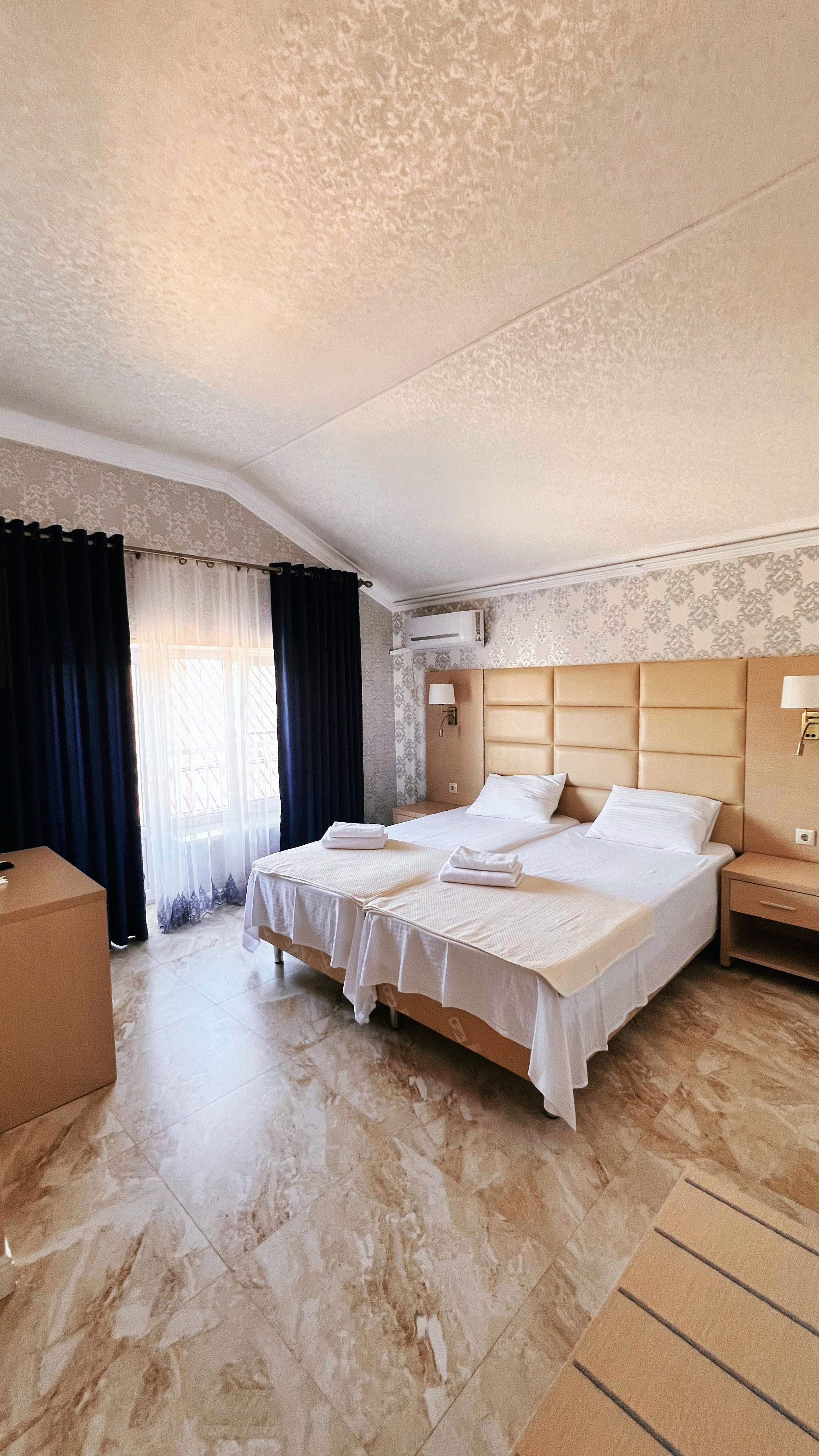 Улучшенный двухместный номер с 1 кроватью или 2 отдельными кроватями, вид на город