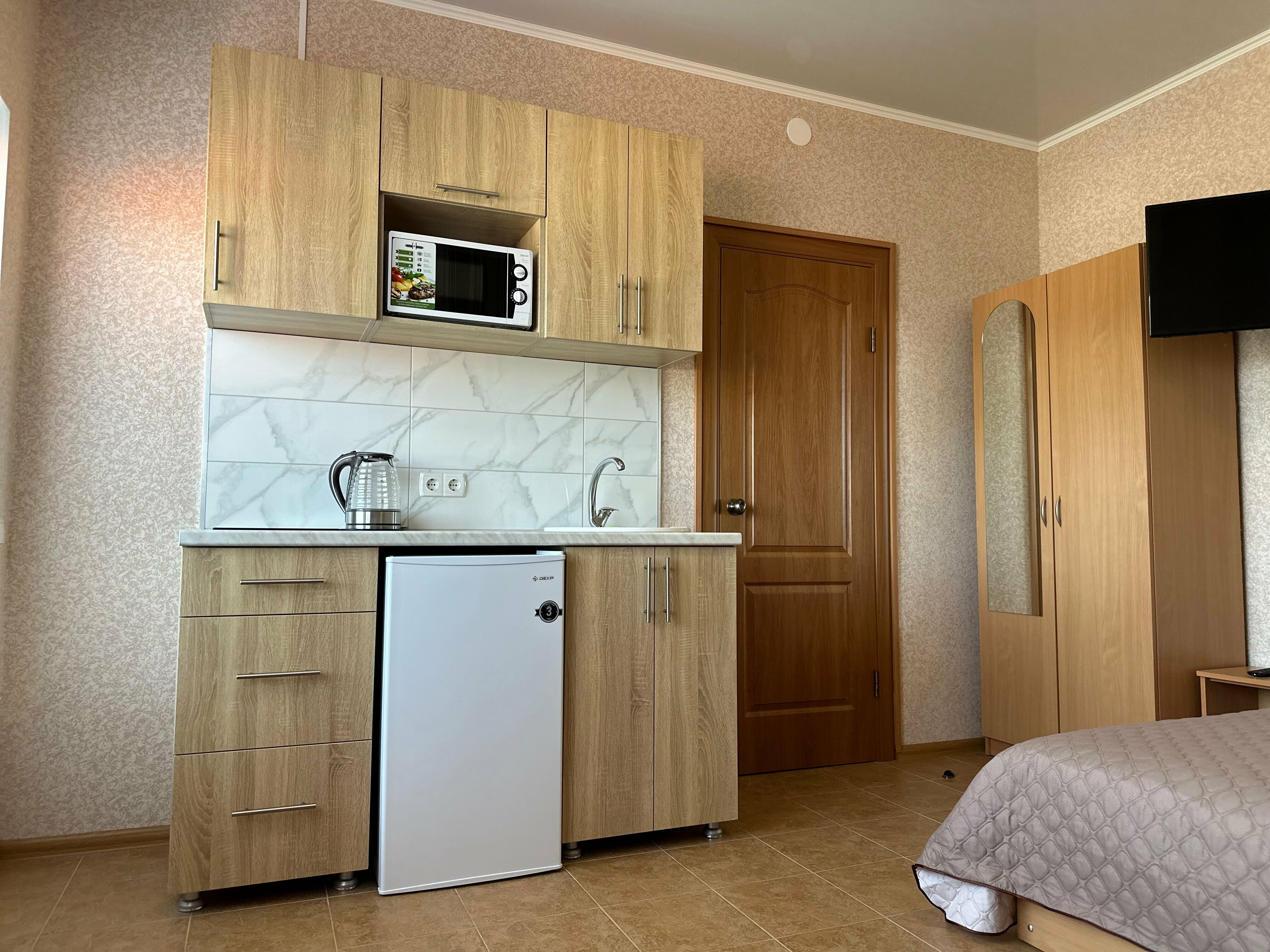 Стандартный 3-х местный номер с балконом и кухней в номере