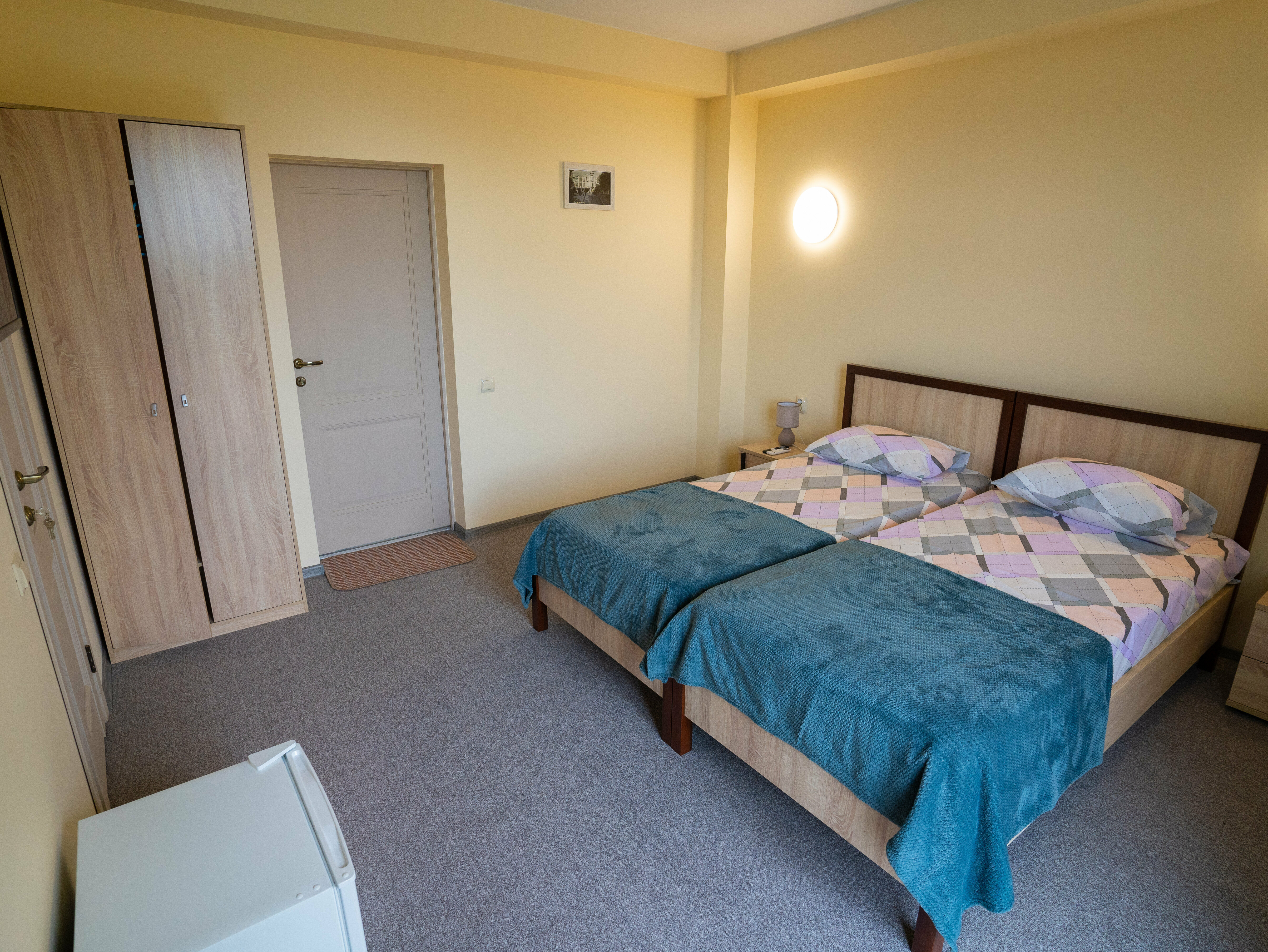 Двухместный номер с 2 отдельными кроватями и балконом