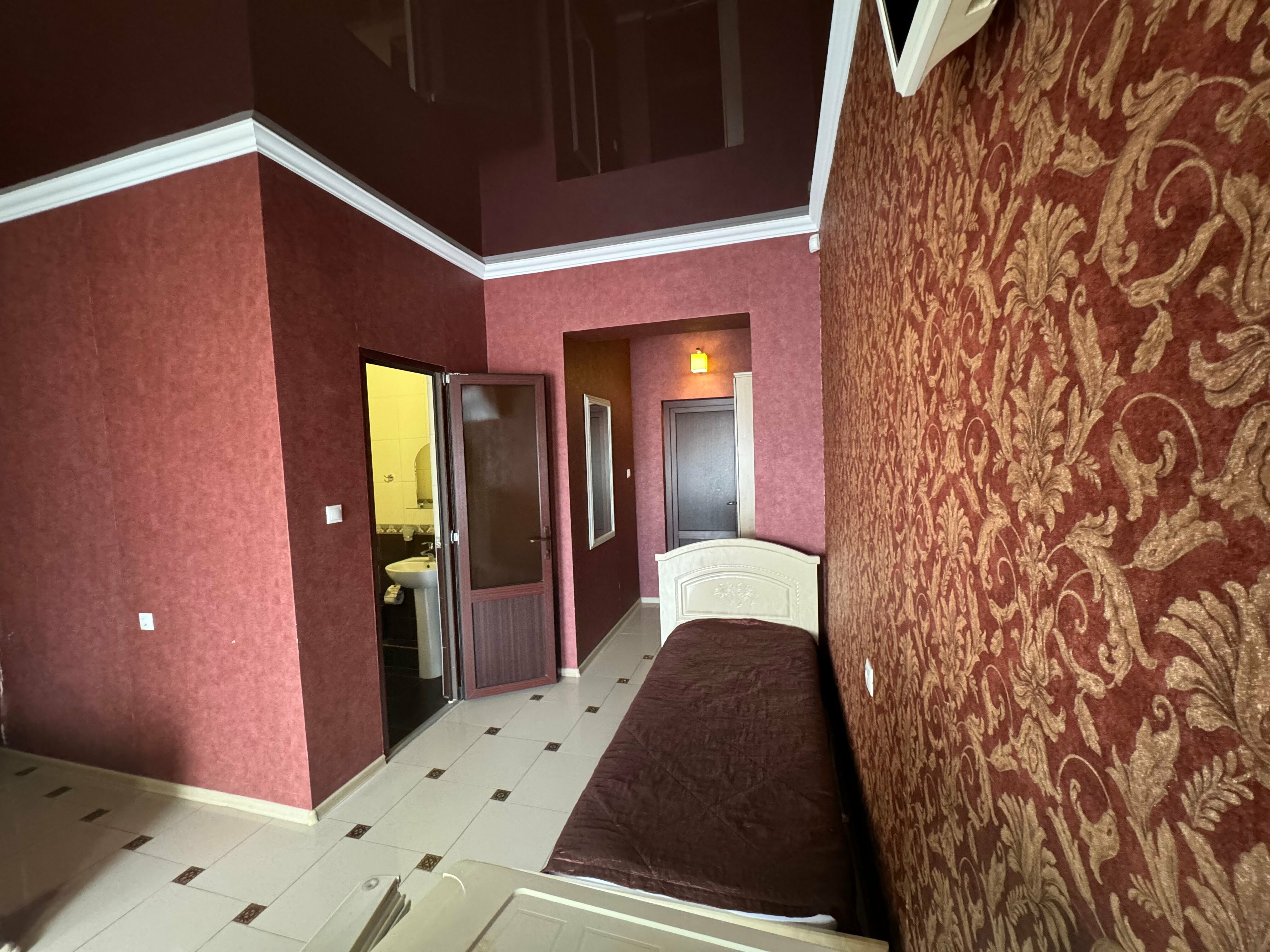 Трехместный номер Делюкс