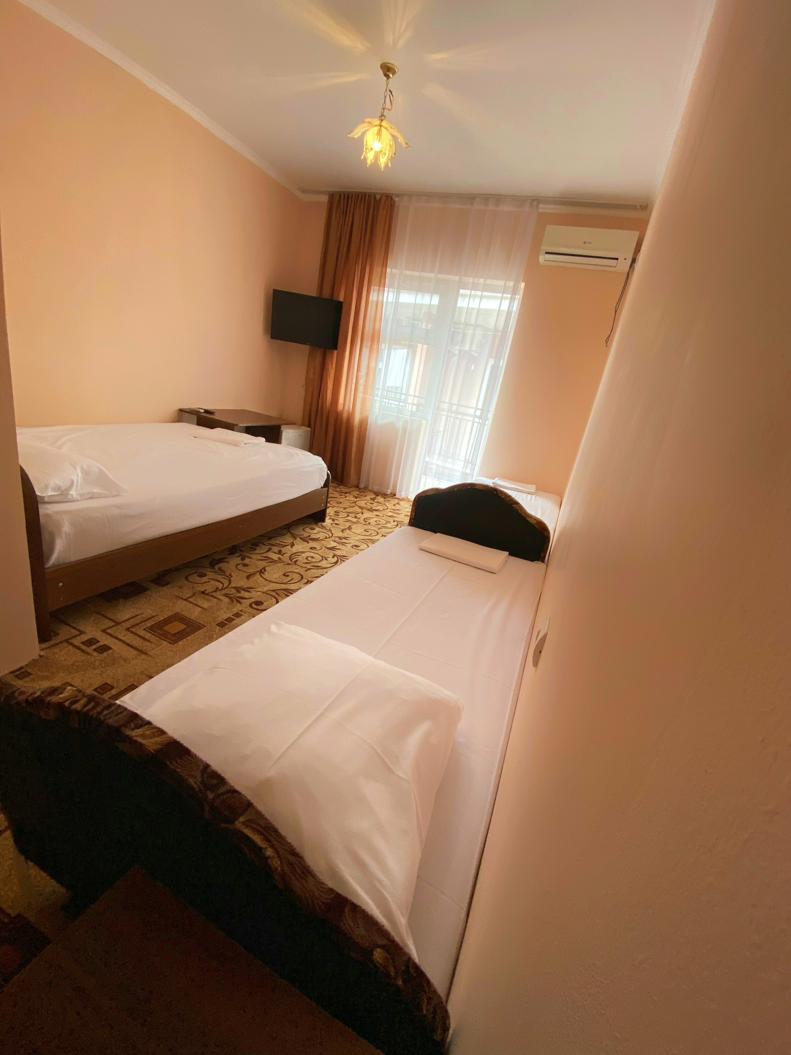 Четырехместный номер с балконом