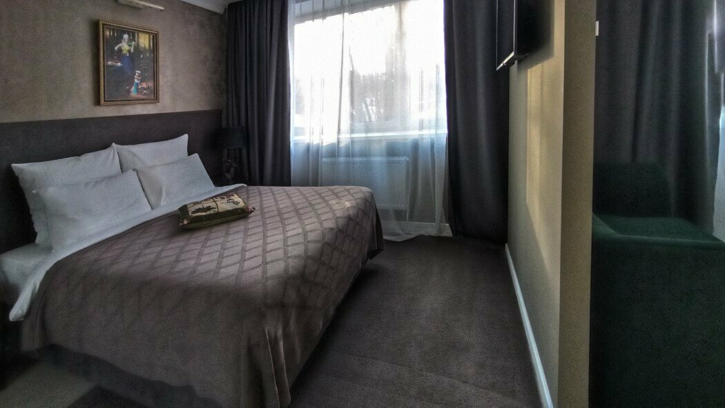 Студия люкс с одной большой двуспальной или двумя отдельными кроватями и диваном