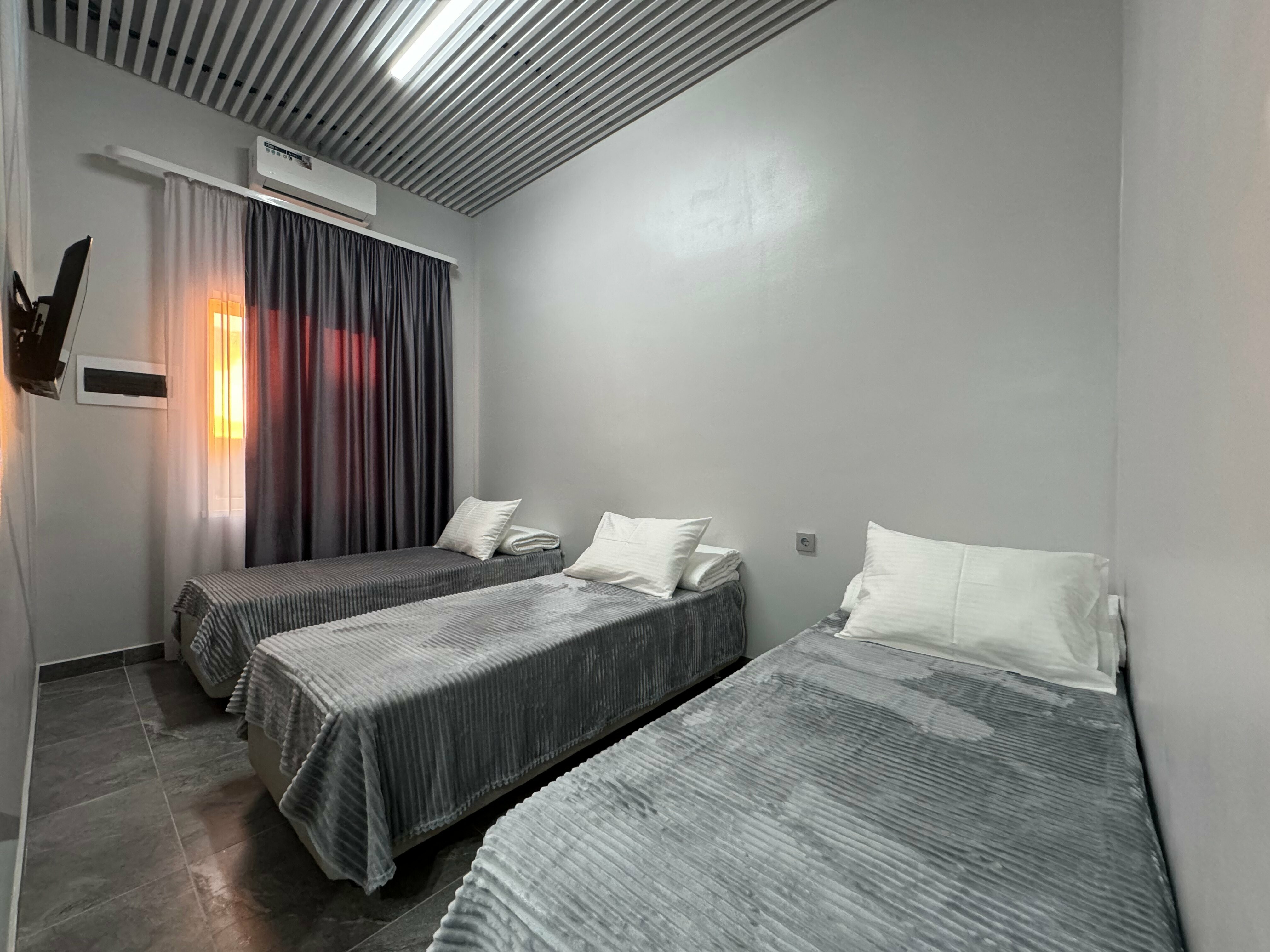 Улучшенный трехместный номер