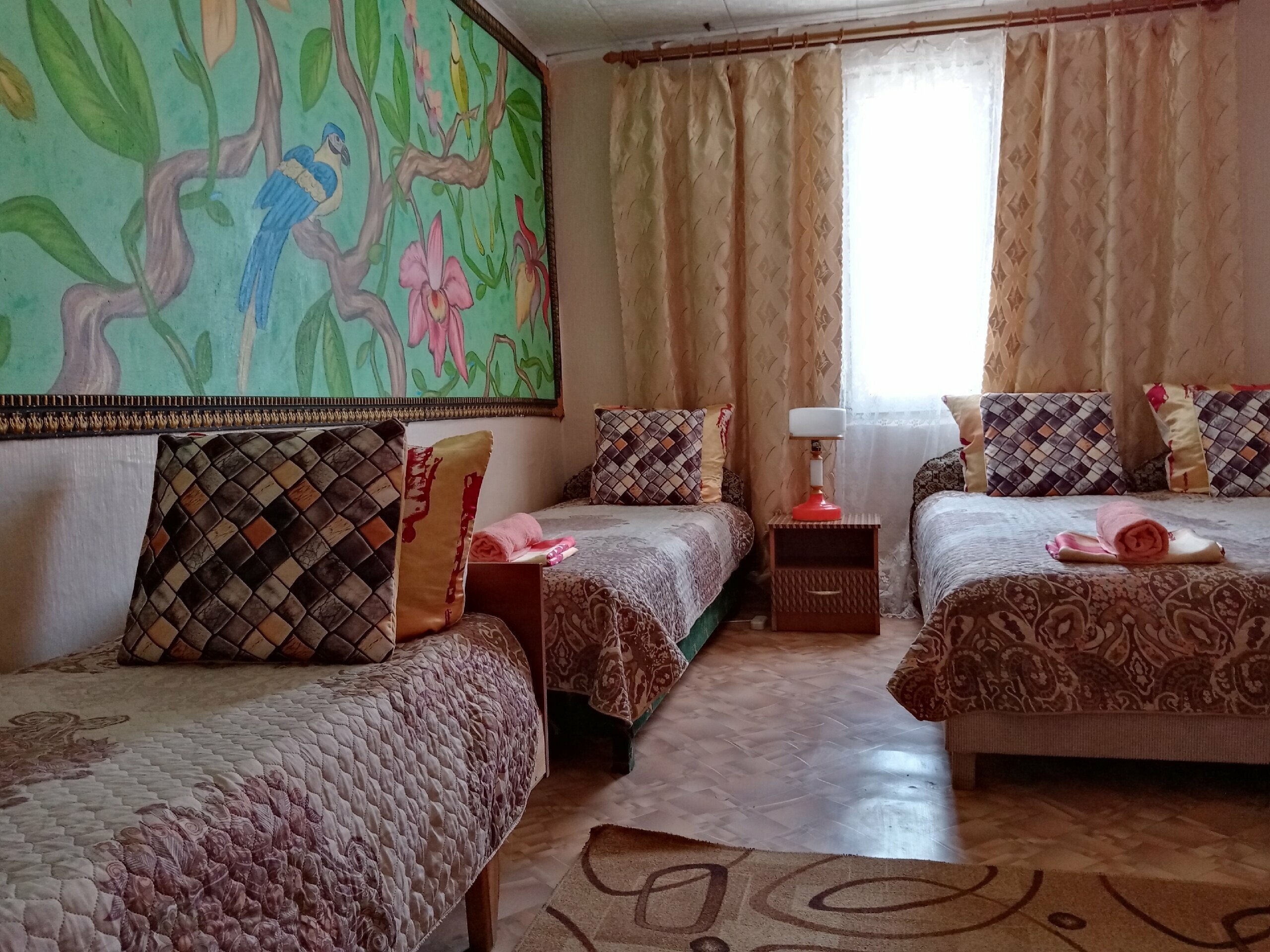 Улучшенный четырехместный номер