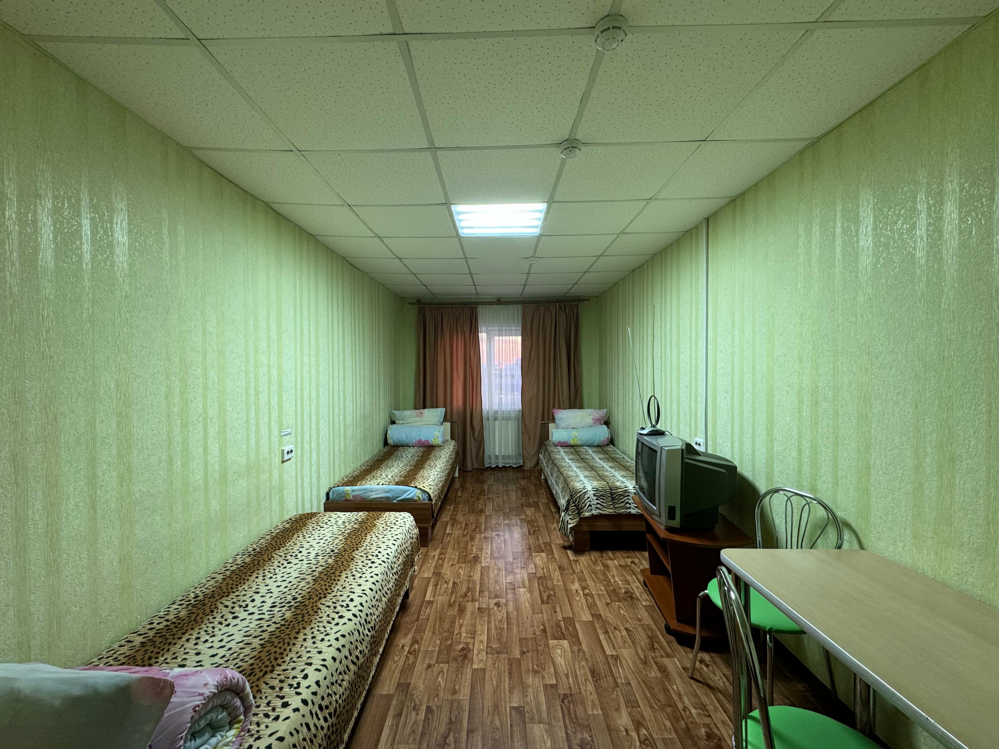 Четырехместный номер с общей ванной комнатой