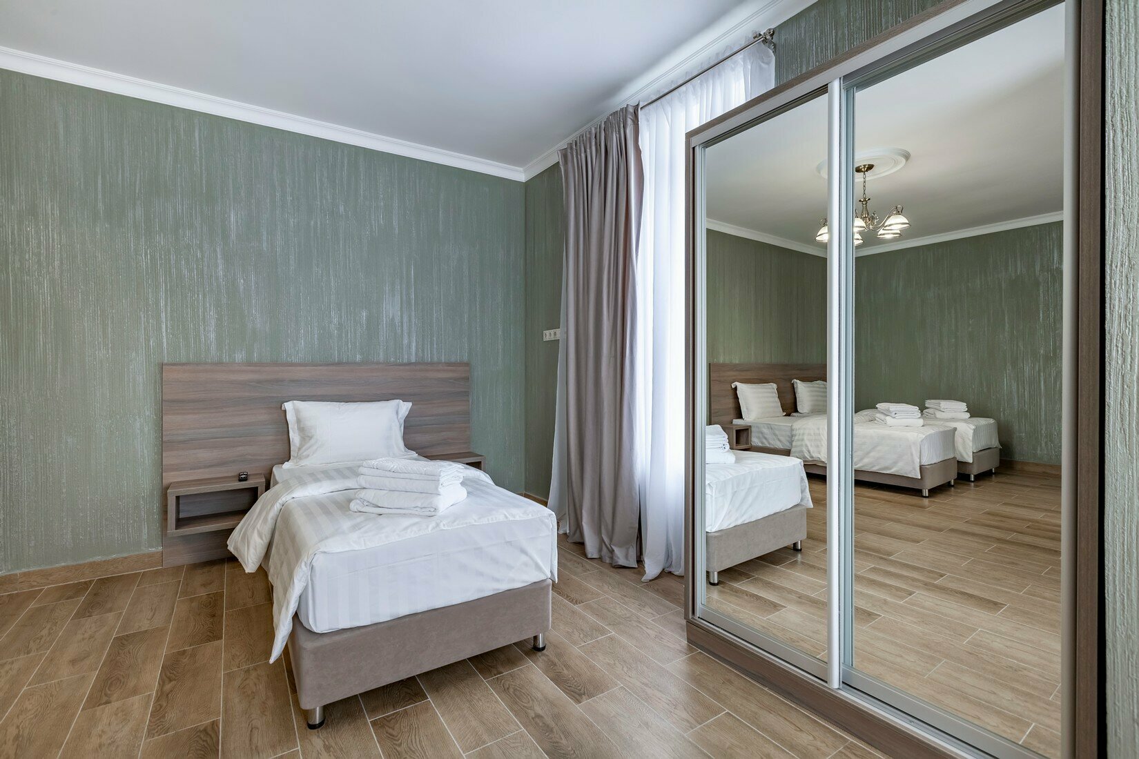 Улучшенный трехместный номер