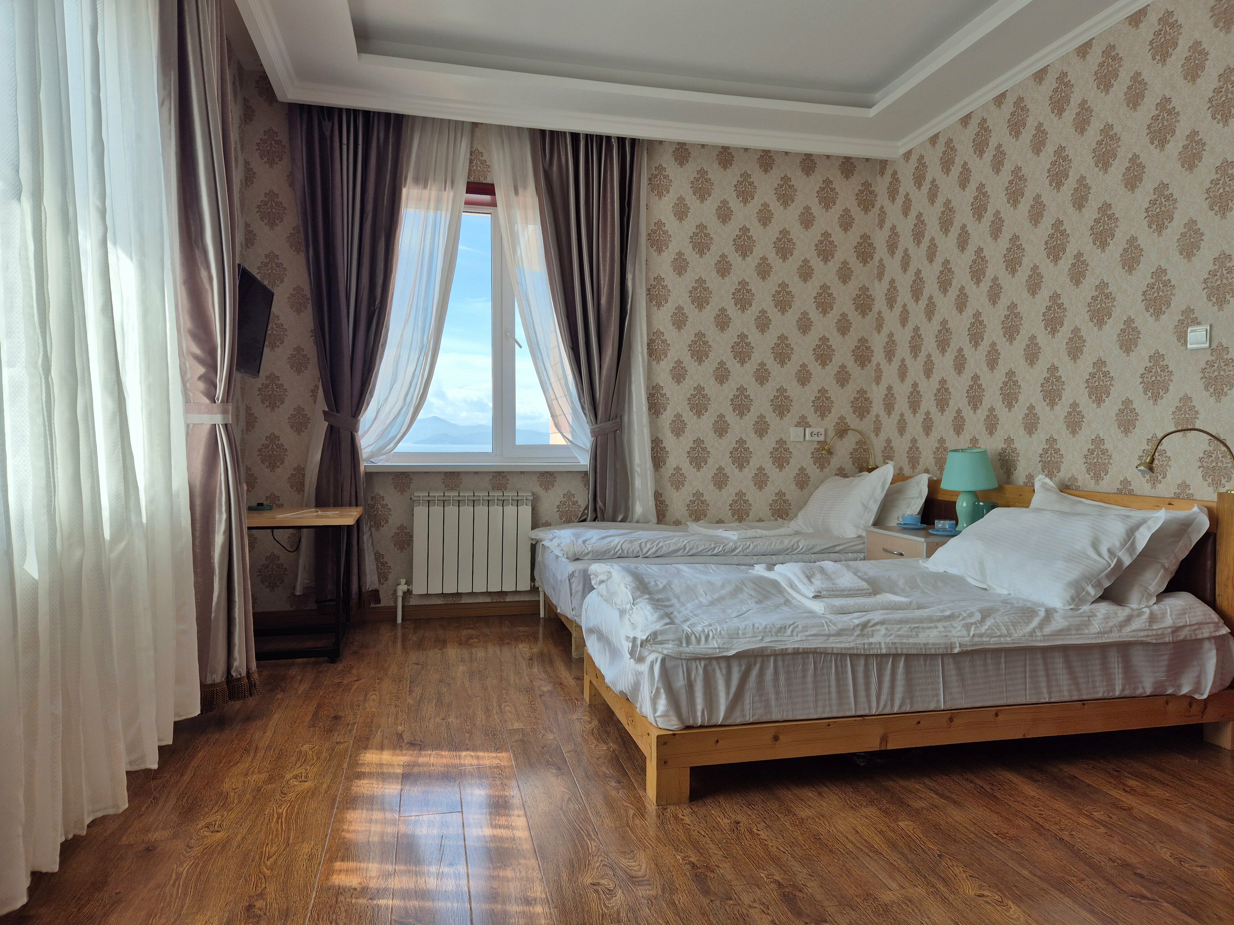 Двухместный номер с 2 отдельными кроватями и ванной