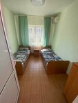 Двухместный номер с 2 отдельными кроватями и общим туалетом в Лилия