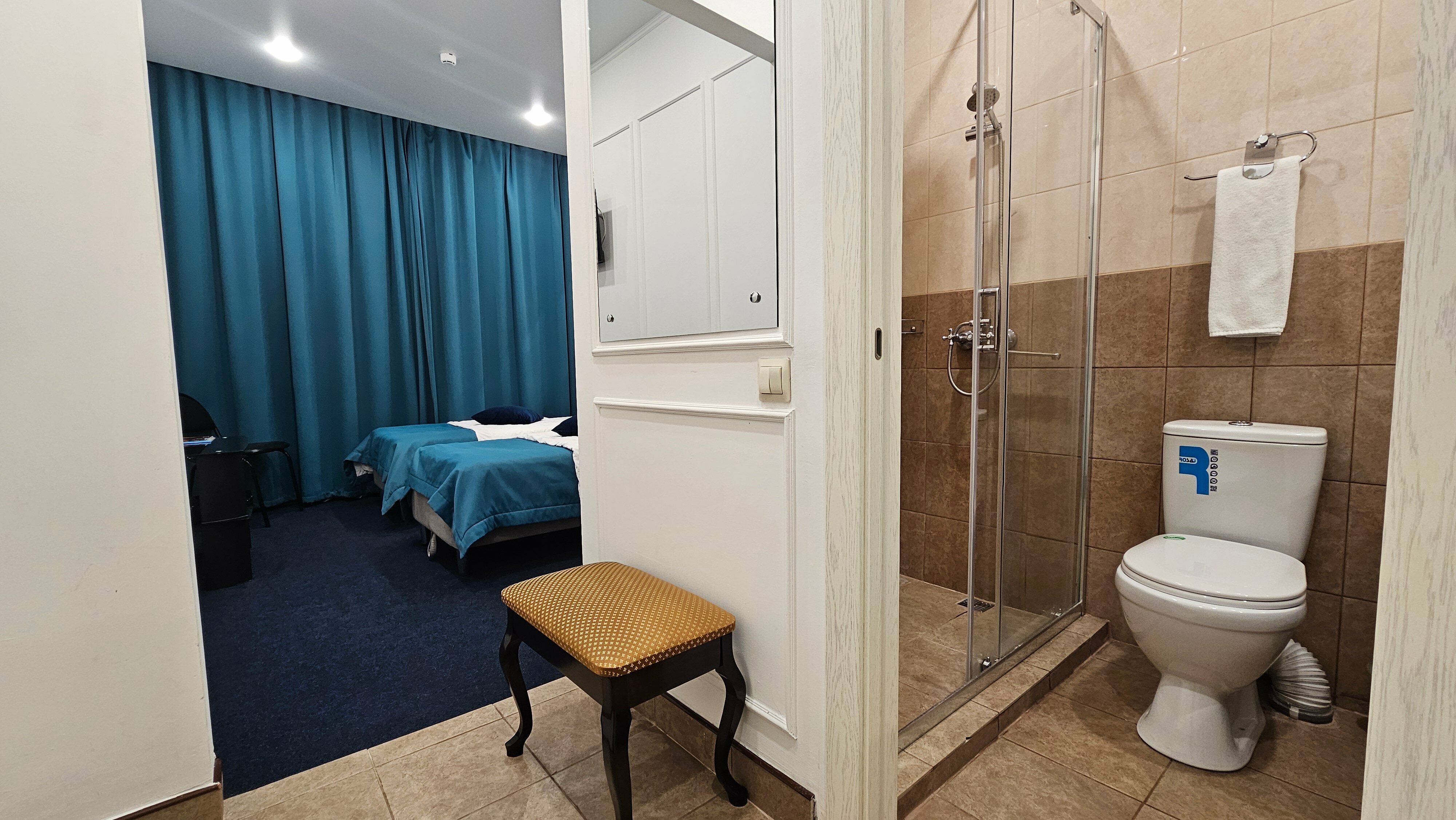 Двухместный номер с 2 отдельными кроватями и душем