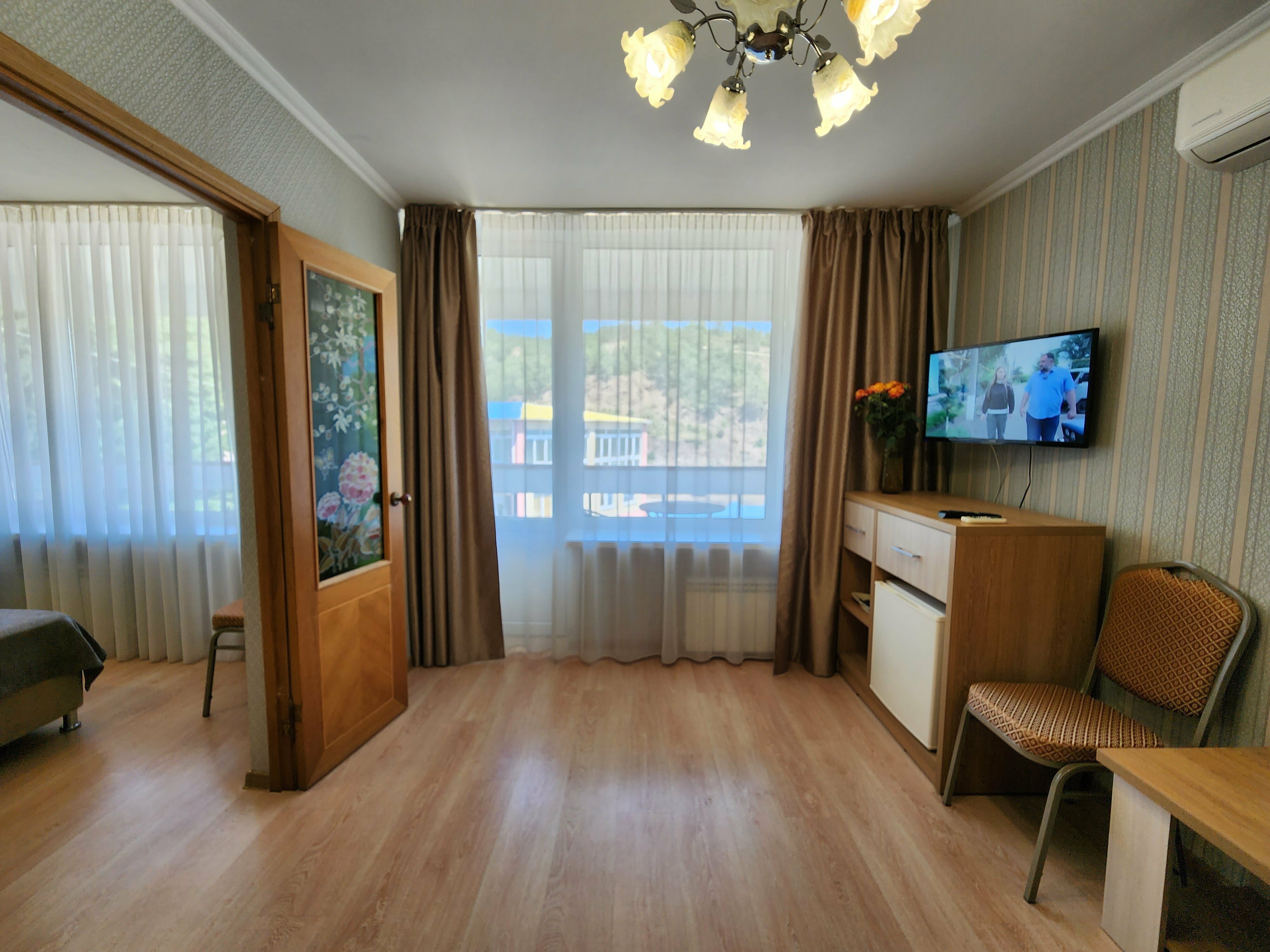 Четырехместный номер с балконом