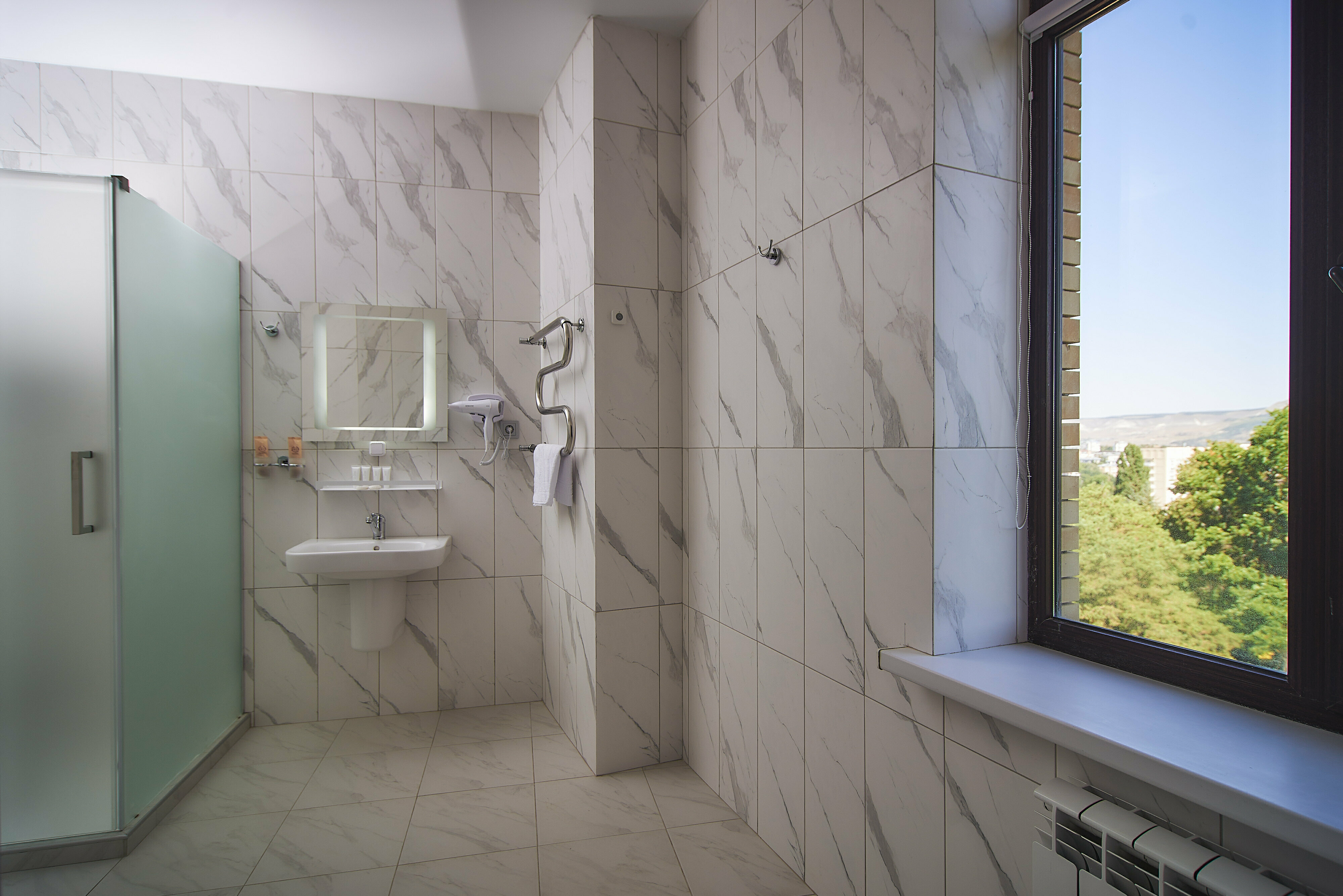 Четырехместный номер Делюкс