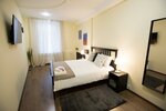 Номер стандарт эконом с 1 двуспальной кроватью в Sleep Inn