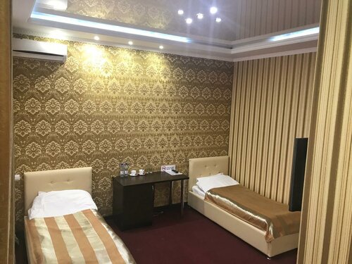Номер стандарт с 2 односпальными кроватями в Империал