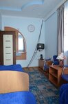 Номер комфорт с 4 односпальными кроватями в Капитал