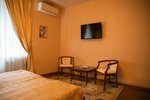 Номер стандарт с 1 двуспальной кроватью в Шарли