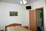 2-комнатный номер люкс с 3 односпальными и 1 двуспальной кроватью в Регион 86