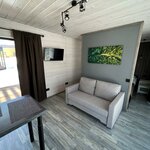 Коттедж улучшенный с 1 двуспальной кроватью и диваном в Карлен